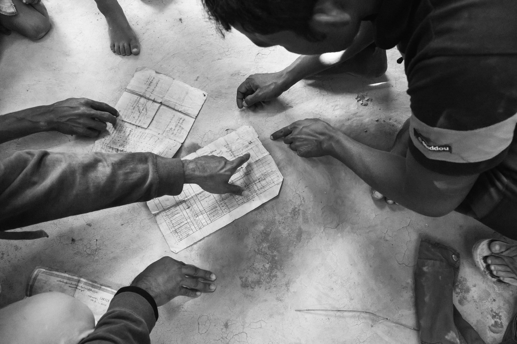 Ayub and his family showing original burmese family register and a birth certicicate from his grandfather, demonstrating that his family has been settled i Myanmar for generations contrary to being illigal immigrants from Bangladesh as the Burmese authorities claim. Balukhali refugee camp, Bangladesh, February 2017
