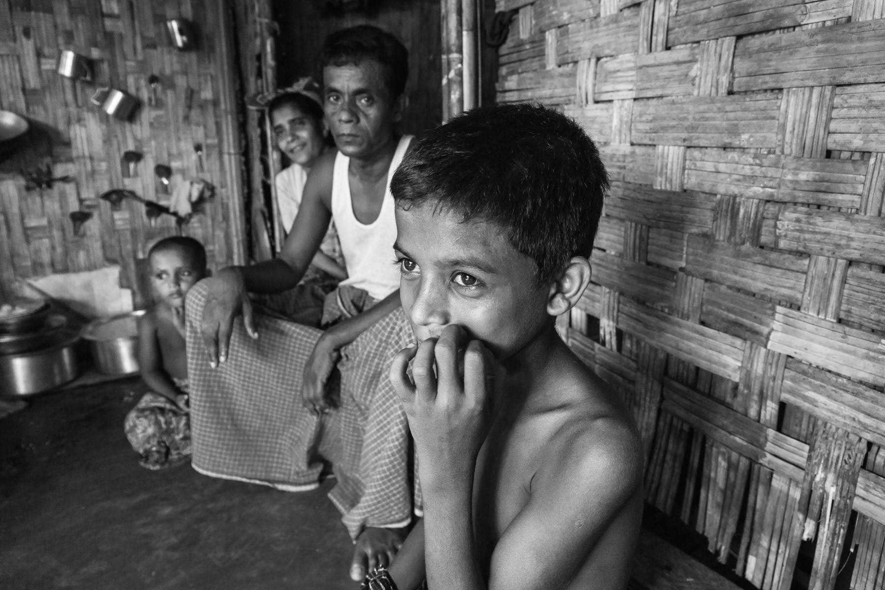 Rohingya family in their shelter waiting for better days. Dar Paing IDP camp, Sittwe township, Myanmar, May 2016