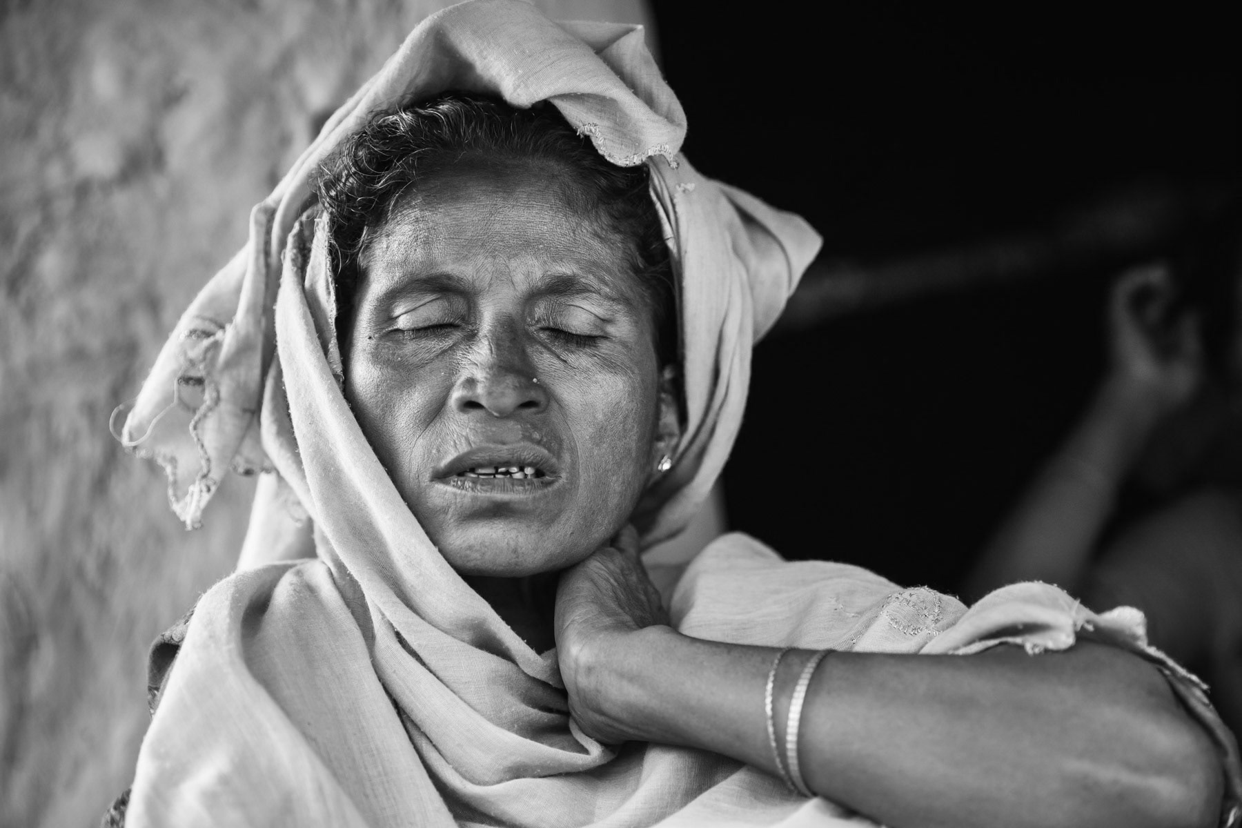 Nura Shah is 50 years old and a Rohingya refugee from Maungdaw in Myanmar. Two of her sons and husband were arrested by the military 5 months ago and are in Buthidaung jail. She fled to Bangladesh with her 15 year old son. Kutupalong camp for Rohingya refugees in Southern Bangladesh along the Myanmar border, May 2017