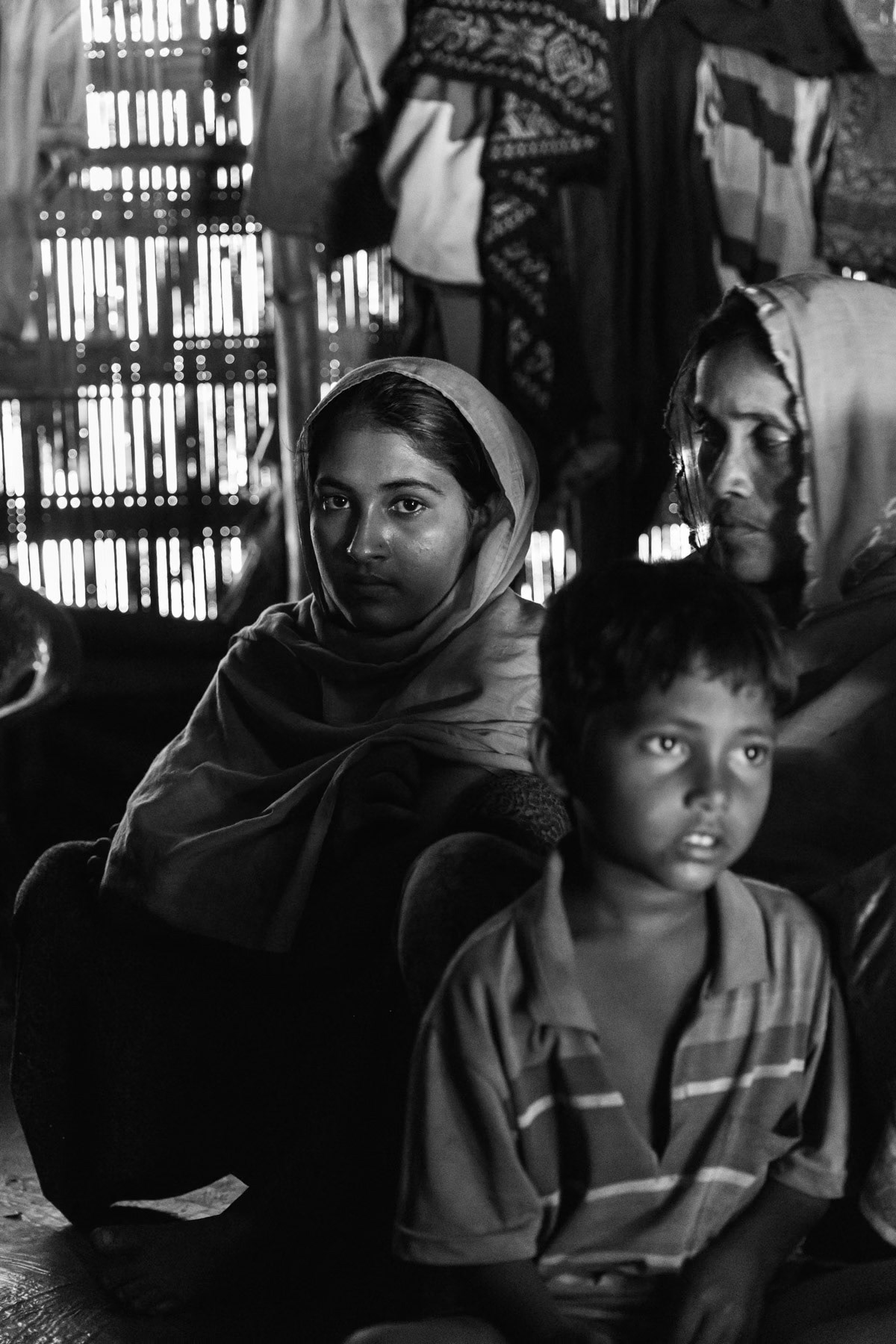 Rohingya woman that has recently arrived in Bangladesh and is being hosted by a relative. Shamlapur refugee camp, Teknaf, Bangladesh, February 2017