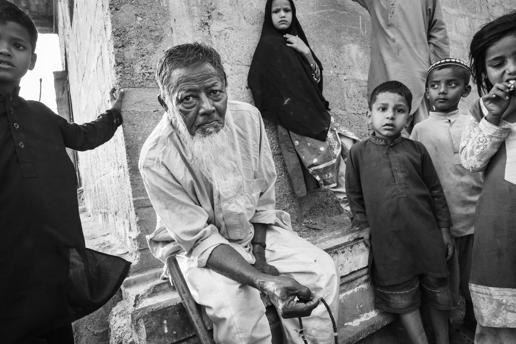 A Rohingya man, part of the first generation that came as a refugee from Burma end of the seventies. Arkanabad, Rohingya neighbourhood in Karachi, Pakistan, December 2016