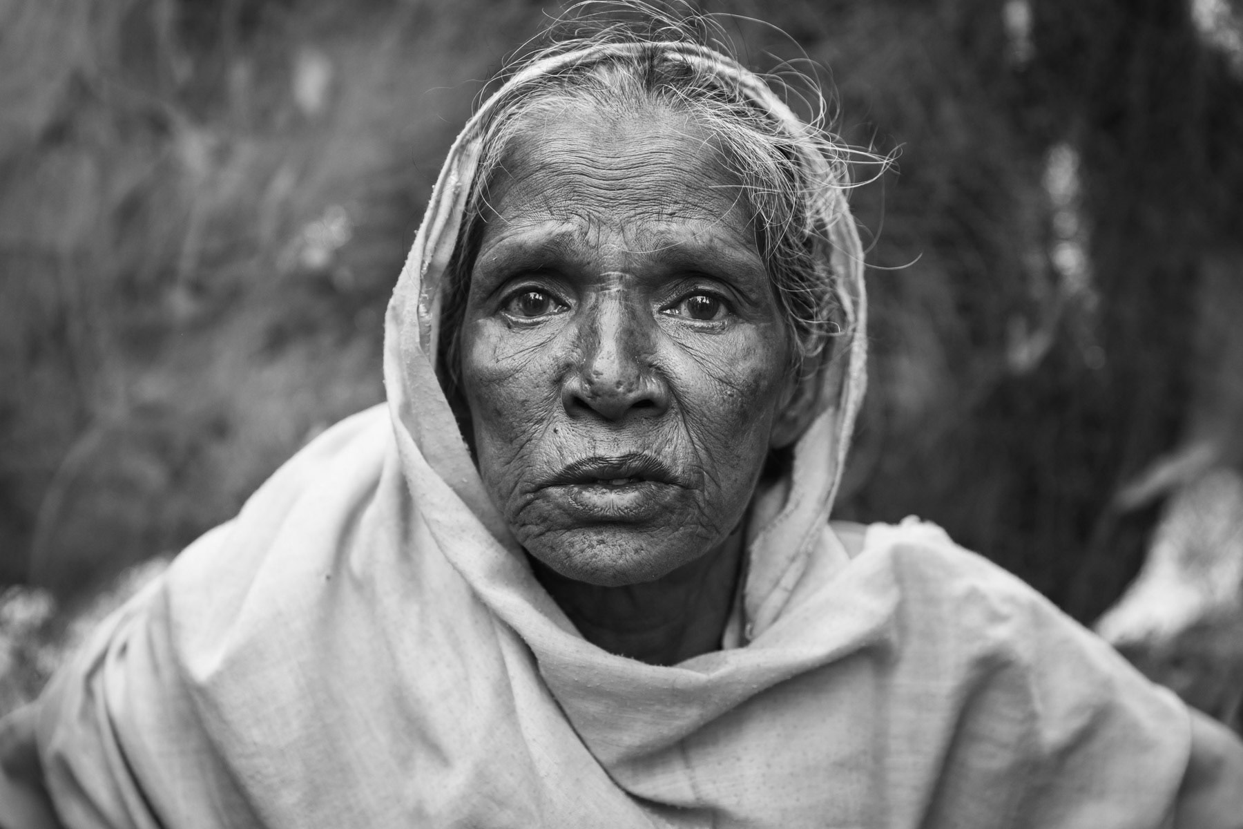 Elderly Rohingya woman victim of prolonged torture in Burma, she can't talk since then. Arrived mid January 2017 in Teknaf. Shamlapur refugee camp, Bangladesh, February 2017