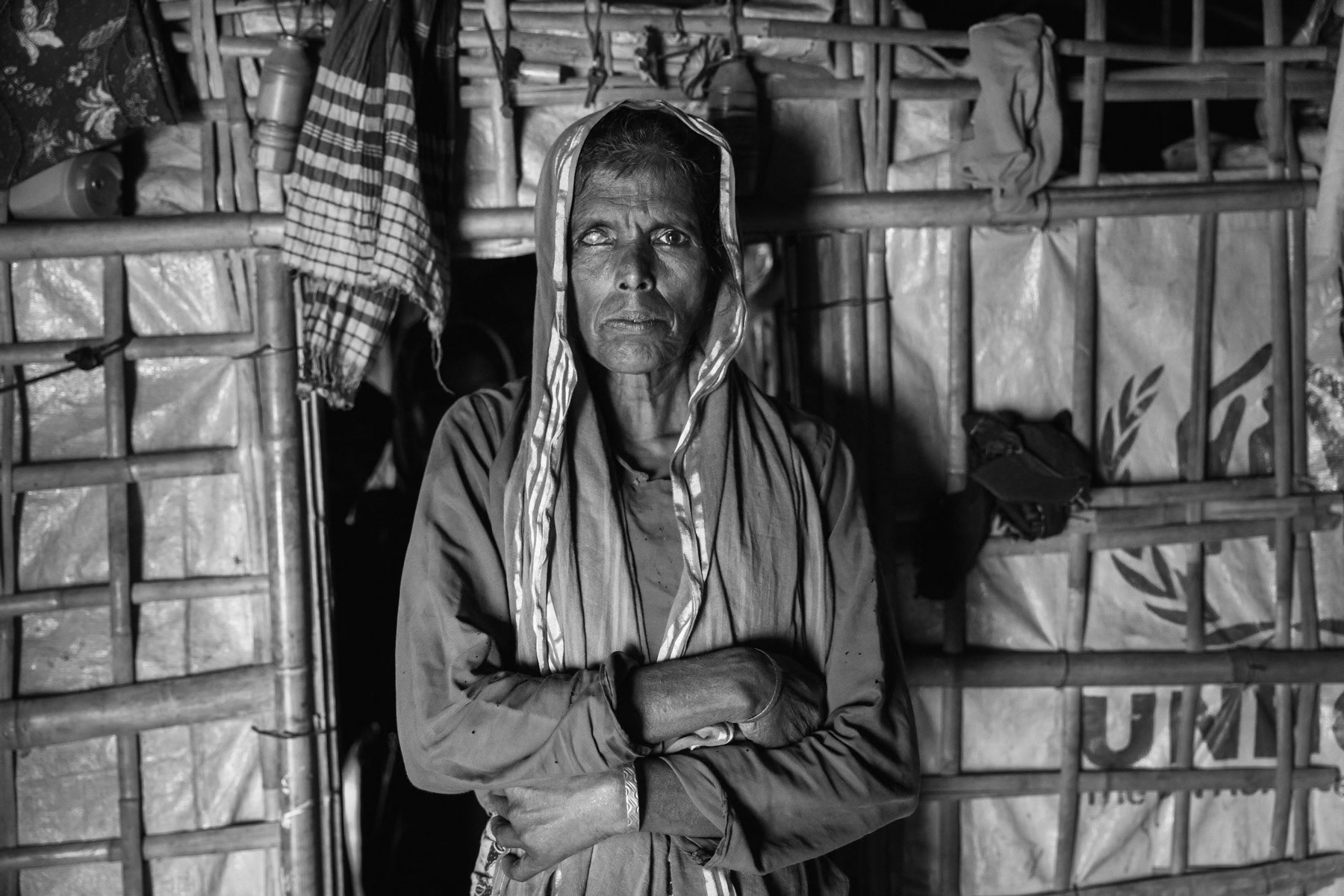 Mahada Khatun, 50 years old Rohingya refugee from Burma. She got injured to one eye by a branch while escaping through the jungle. She has lost sight on that eye. Kutupalong refugee camp, Bangladesh, October 2018