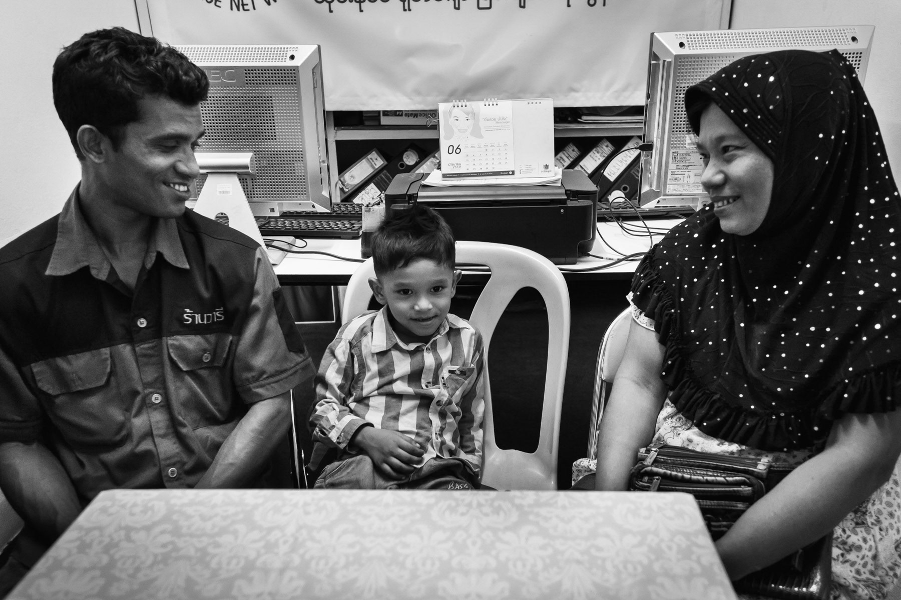A mixed Rohingya Rakhine couple living in exile in Bangkok with their four year old son. Rangsit, Banggkok, Thailand, June 2016