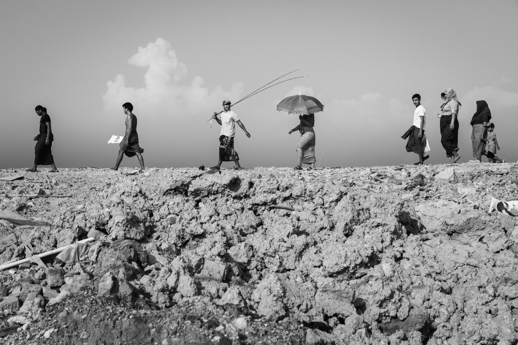 Rohingya contruction workers coming to get information on how to register as refugees with the UNHCR. Desa Ku construction site in Kedai Province, Malaysia, June 2017