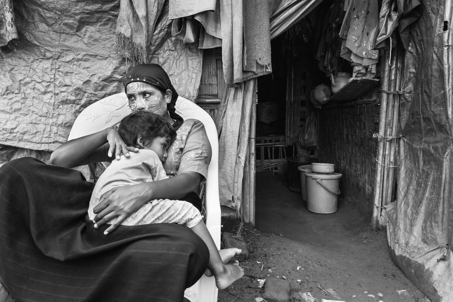 Mother and child in Ohn Taw Gyi camp for the persecuted Rohingya minority of Rahine State in Myanmar. Over 120,000 Rohingya live forcibly in concentration camps around Sittwe since 2012. Sittwe, September 2015