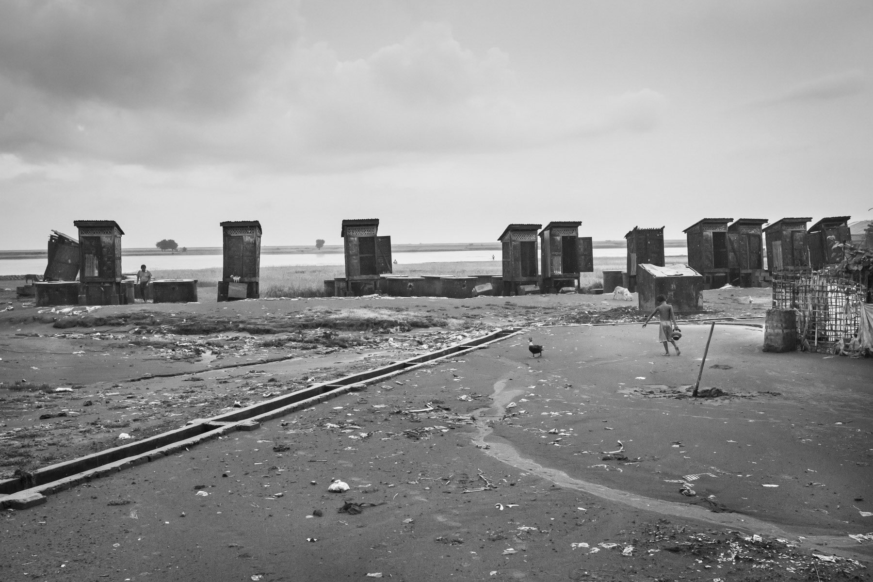 Latrines on the edge of the camp limit's near the flooded areas. Baw Du Pha camp for forcibely displaced Rohingya from Sittwe township, Rakhine State, Myanmar, October 2016