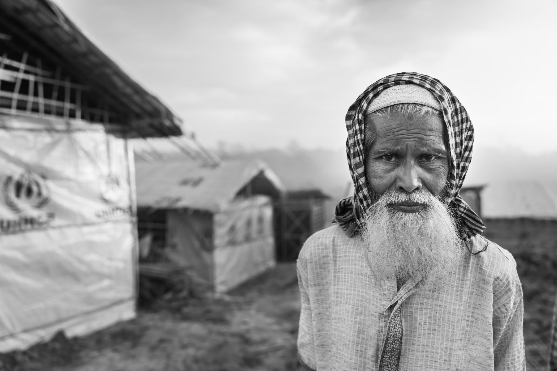A Rohingya refugee that recently arrived from Myanmar. Rohingya have fled Myanmar since August and the start of the latest military security operations that are now widely qualified as ethnic cleansing campaigns. Kutupalong refugee camp, Ukhiya, Bangladesh, November 2017