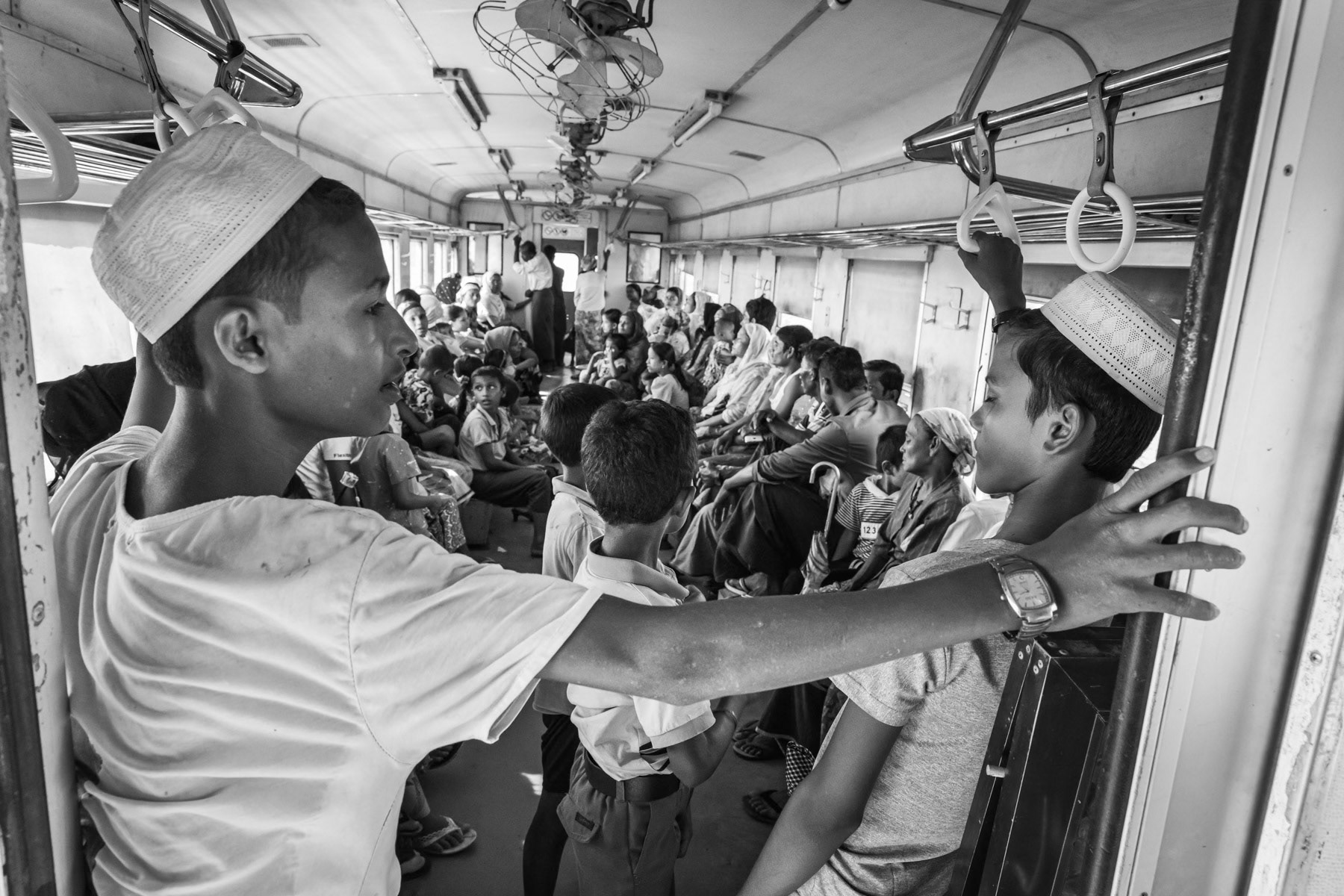 Rohingya villagers travelling by train to the IDP camps where 130,000 Rohingya have forcibly be settled since 2012. Sittwe township, Rakhine, Myanmar, September 2019