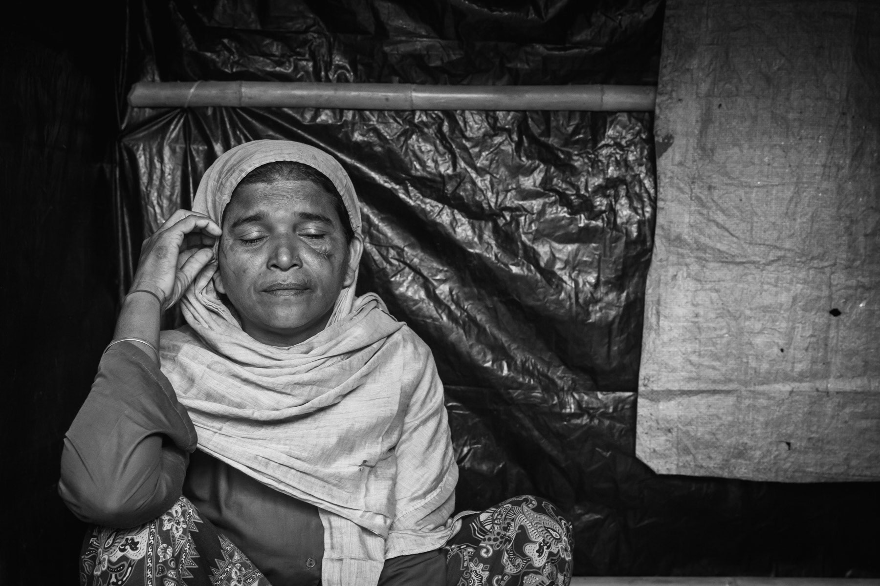 Farida K., 40 years, from Tula Toli. It took her 4 days to reach Bangladesh after she fled. She was attacked and taken away by the military forces and consequeuntly gang raped and assaulted with a machette. She was beaten while being raped by more than 10 military and local militia. Out of her 9 children, 7 were killed during the attack as well as her husband. Her 2 remaining children of 12 and 13 are with her in Bangladesh. Her 15 year old daughter was raped and killed by decapitation. There have been countless witnesses of atrocities by the Burmese regime and its military forces. Human rights commissions and international groups have called the ongoing onslaught a schoolbook case of ethnic cleansing evolving into a genocide of the Rohingya community in Rakhine. Balukhali camp for Rohingya refugees in Bangladesh, November 2017