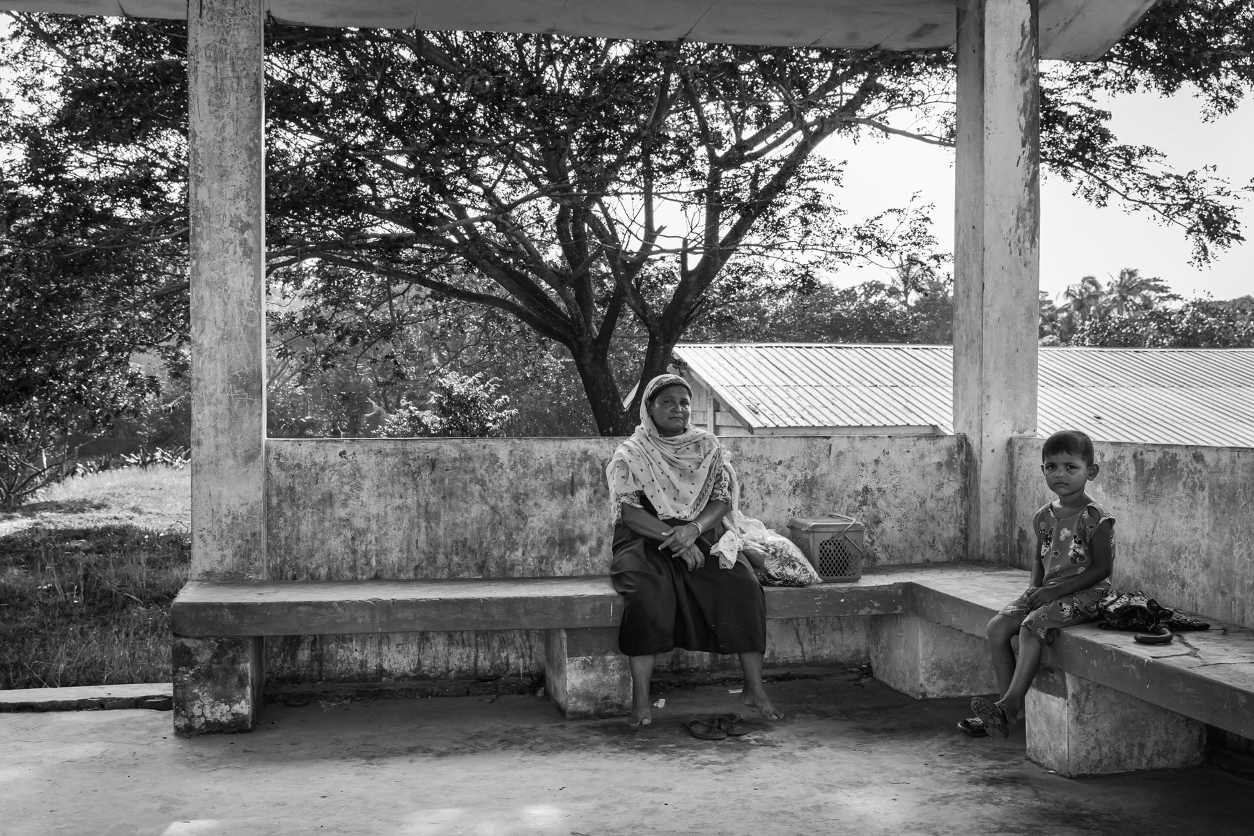 Rohingya waiting for the train to leave and return to the IDP camps after visiting relatives in a nearby Rohingya village. The daily train is the sole means of transportation Rohingya are allowed to take to travel between the villages and the IDP camps. They are not allowed to travel all the way to Sittwe city. Rakhine, Myanmar, September 2019