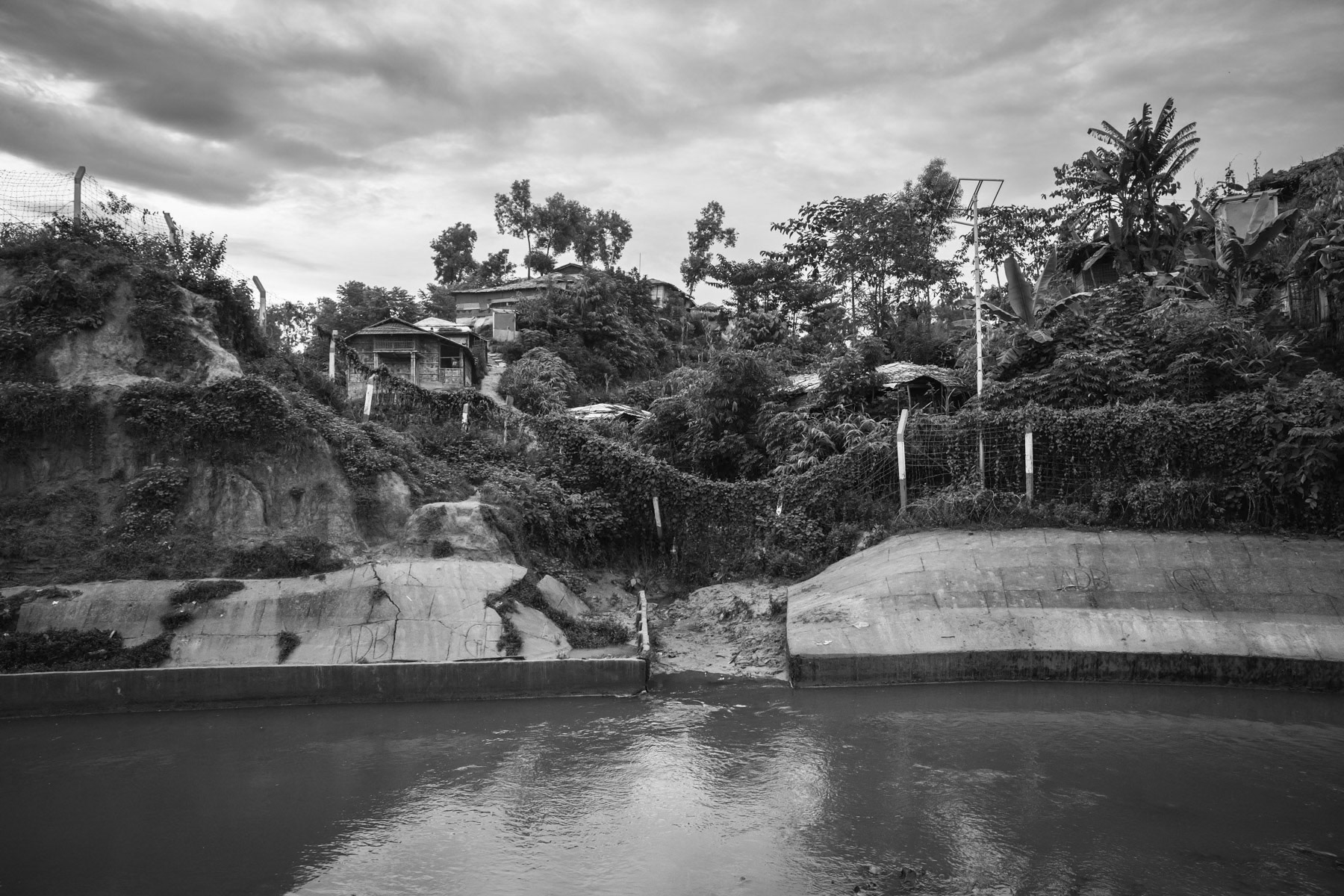 Rohingya refugee camp in Ukhiya where more than one million refugees live since the genocidal ethnic cleansing campaign of 2017 in neighbouring Myanmar. Five years after the massacres and mass exodus there is absolutely no perspective of re-settlement or repatriation. Freedom of movement has been restricted to the camps that are now fully sealed off with fences. Access to education and local schools has been denied, leaving a whole generation in limbo. Rohingya refugee camps, Cox's Bazar, Bangladesh, September 2022