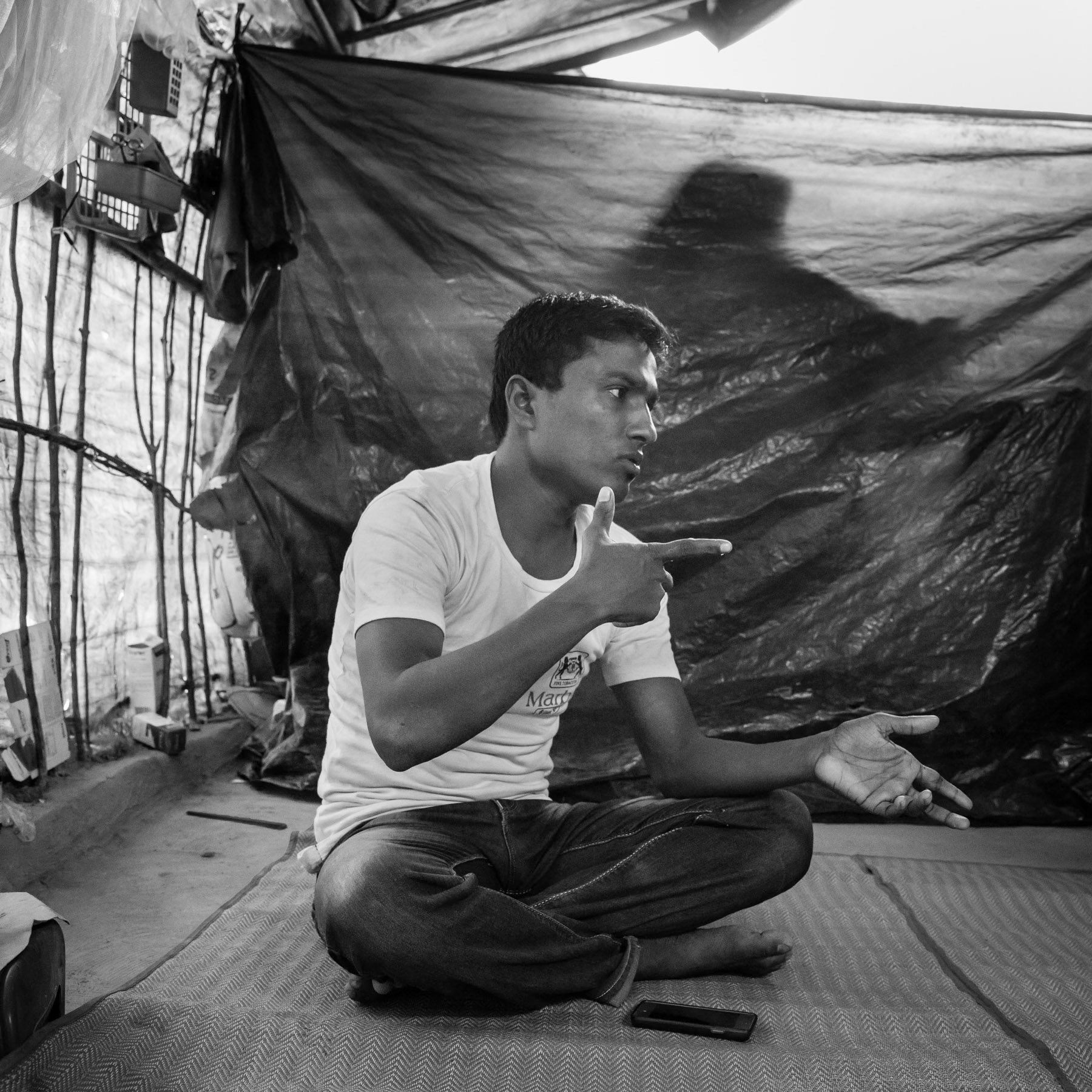 M.S from Boli Bazar, Maungdaw is 25 years and was enlisted to fight for ARSA (Arakan Rohingya Salvation Army). He received training to make rudimentary explosives and how to use a gun with nep guns. Joined ARSA in January 2017 after beeing influenced and recruited by a local village leader. The training camp was in the jungle. The objective of the training was to be able to defend their villages in case of attack. When the military attacked they had only improvised explosives that didn't work and didn't have guns. They were attacked by helicopter gunships. Twenty five ARSA members were present during the attack, he managed to escape, most got killed. According his estimate another 100 villagers got killed during the attack. He is now in the refugee camps along the border in Bangladesh, March 2018