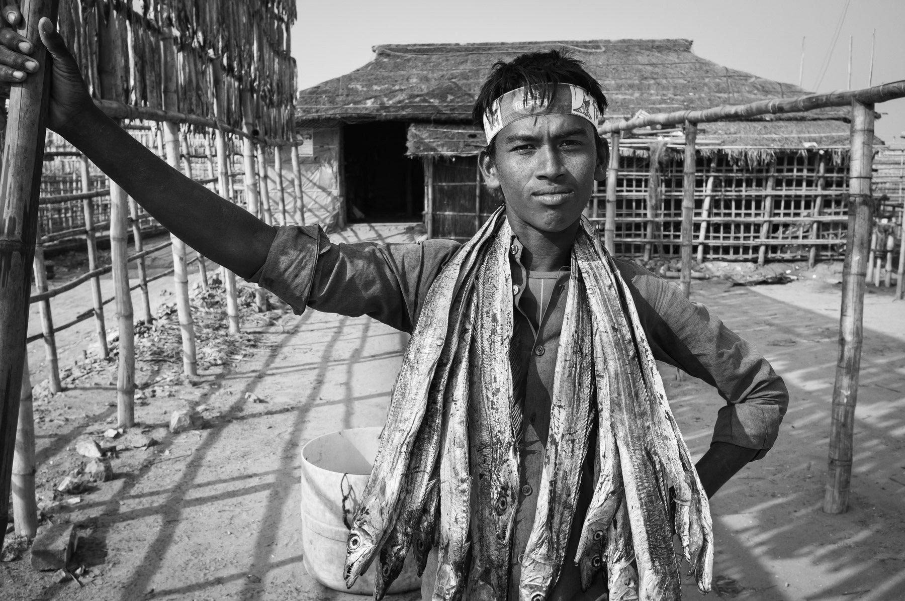 Rohingya daily labour working in the fish drying plants in Cox's Bazar, Bangladesh, December 2015