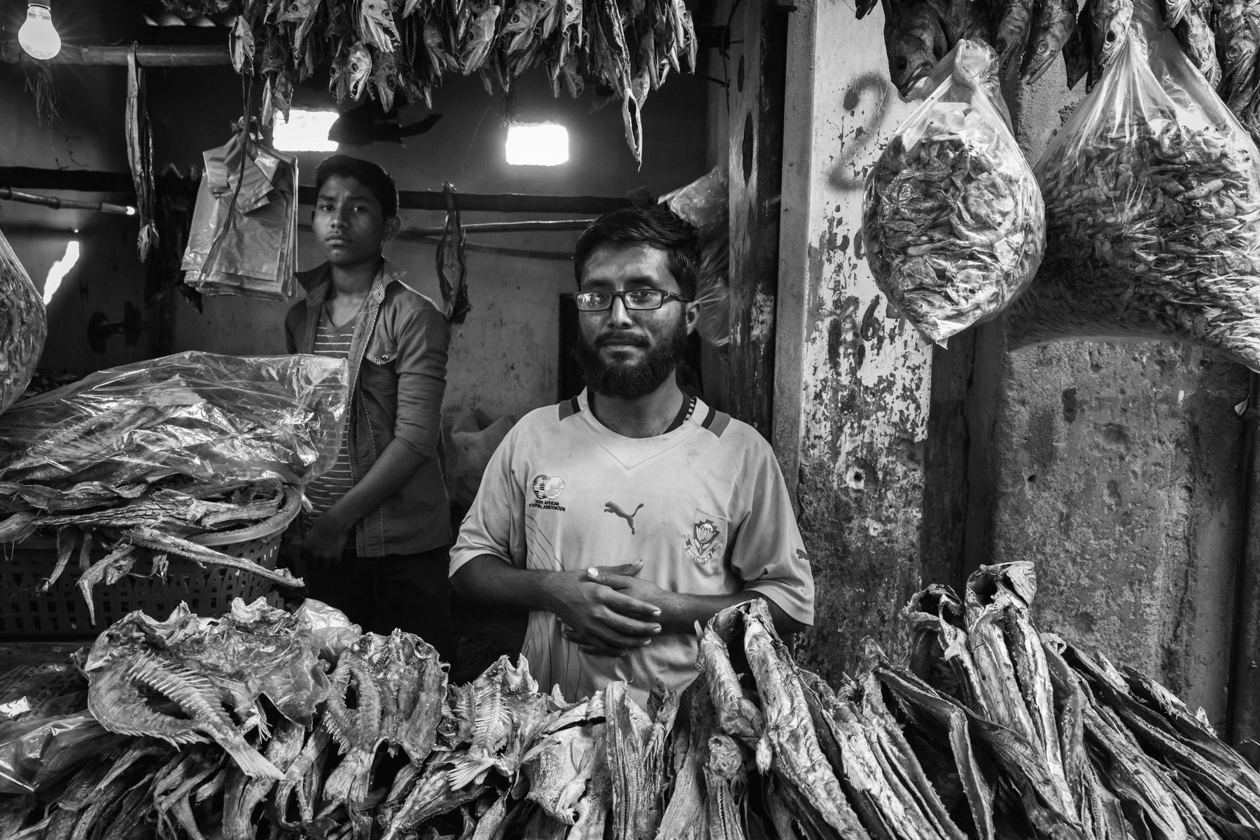 A lot of the 300,000 strong Rohingya community of Pakistan is involved in fisheries like their ancestors in Burma. Dry fish is very popular in Rohingya cuisine. Burma Colony fish market, Karachi, Pakistan, December 2016