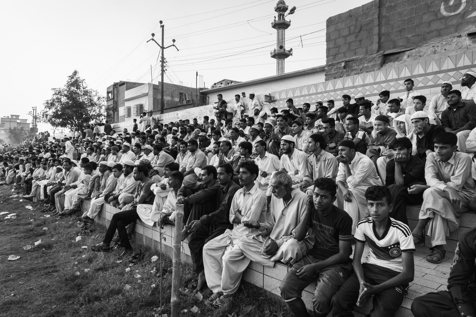 The mainly Rohingya population of Burma Colony attending the last football match of the season of the local team. Burma Colony stadium, Karachi, Pakistan, December 2016