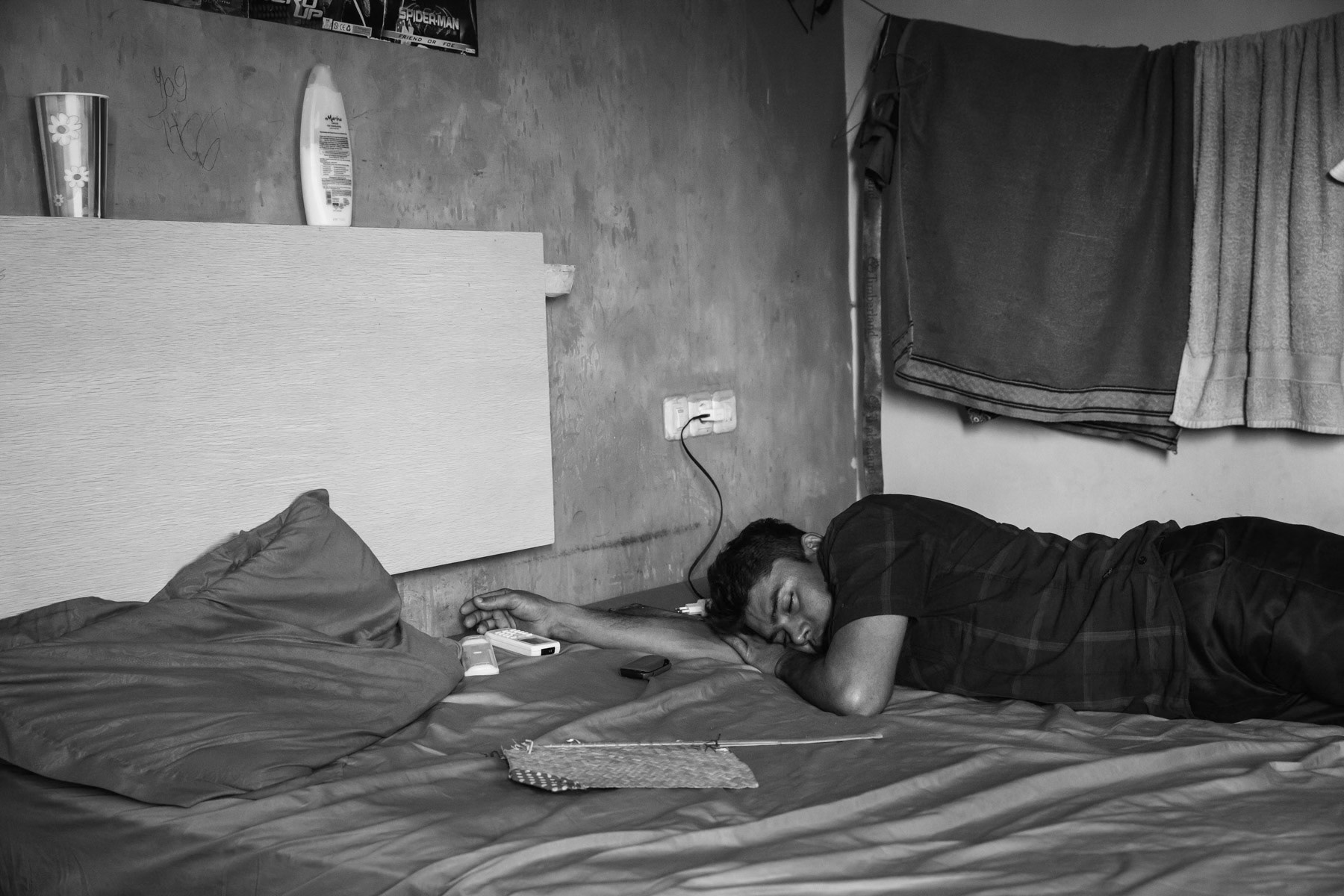 Rohingya refugee in a collective centre waiting for re-settlement in a third country. Most of Rohingya refugees in Makassar have been waiting for over 7 years to receive any news of an unlikely re-settlement having an adverse impact on their mental health state. Collective centre for refugees in Makassar, Sulawesi, Indonesia. November 2018