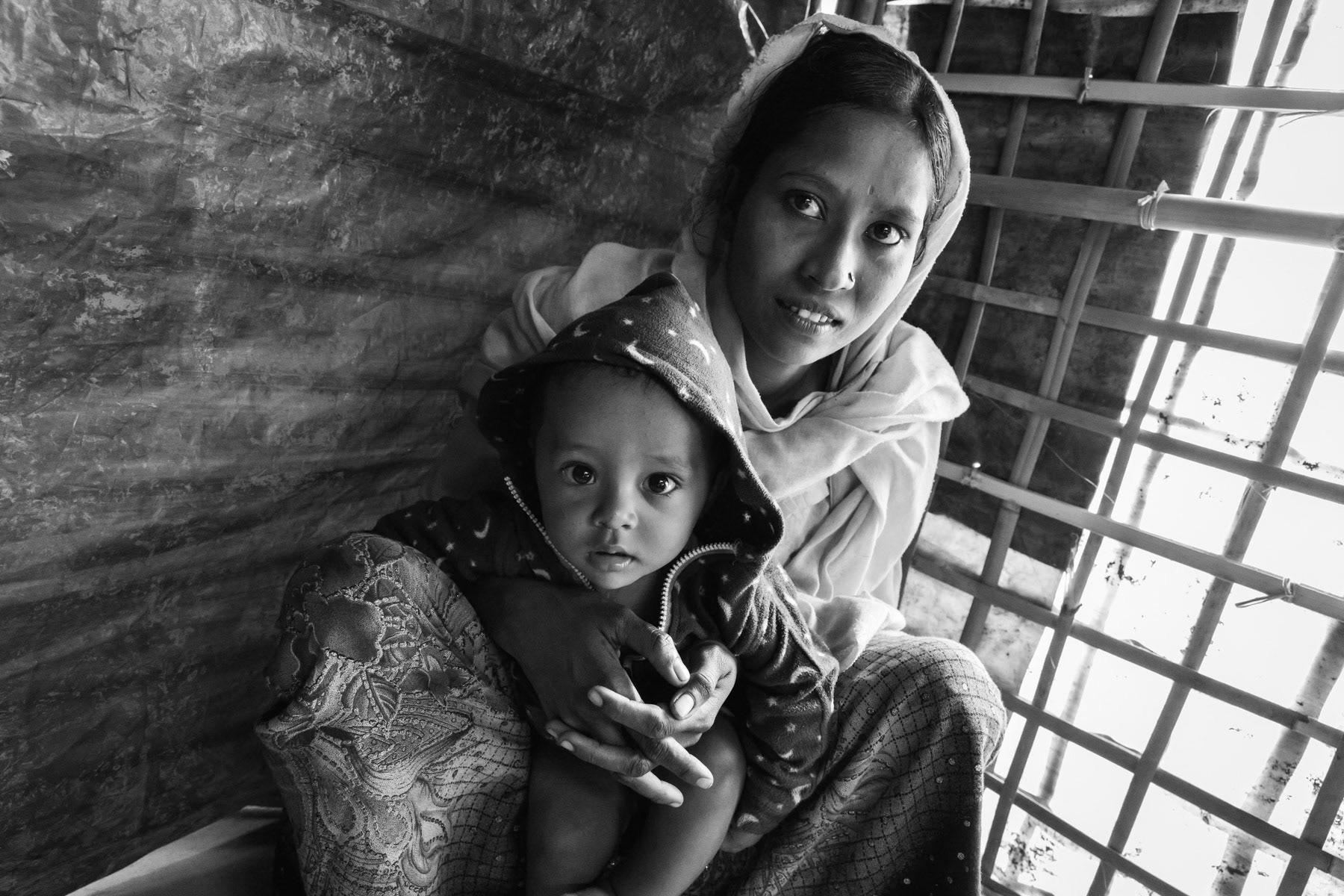 Rohingya woman and her child after having arrived from Myanmar few weeks ago, fleeing persecution. Balukhali camp for newly arrived Rohingya refugees, Bangladesh, February 2017