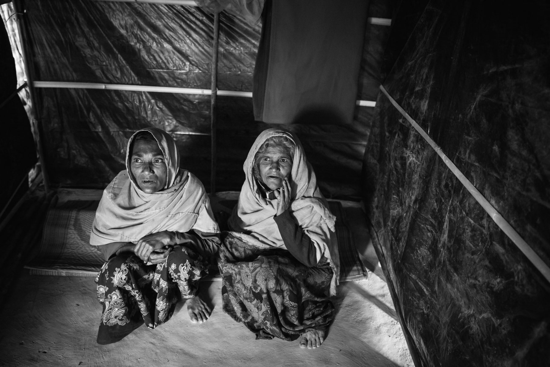 Rohingya women that fled to Bangladesh after their husbands where taken away and killed by the army. Kutupaling refugee camp, Bangladesh, February 2017