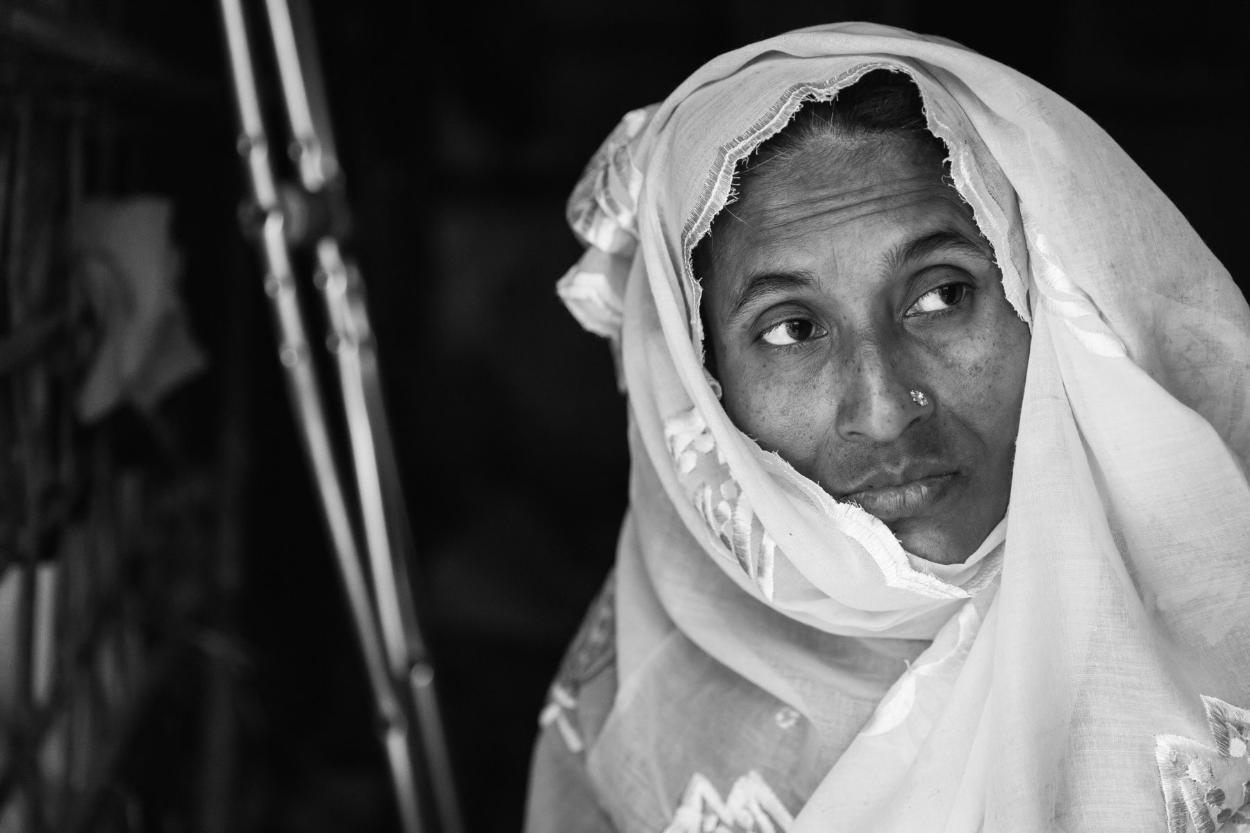 Fatima Begum, 38 years from Maungdaw township. She fled her village with her husband and children. One son of 2 years old felt in a pond while escaping and drowned. She was shot in the leg and after 5 days without any medical attention she was brought to the Chittagong general hospital where her leg was so badly infected that it had to be amputated. She lives now in Thangkhali refugee camp with her husband and two children. Cox's bazar, Bangladesh, October 2018