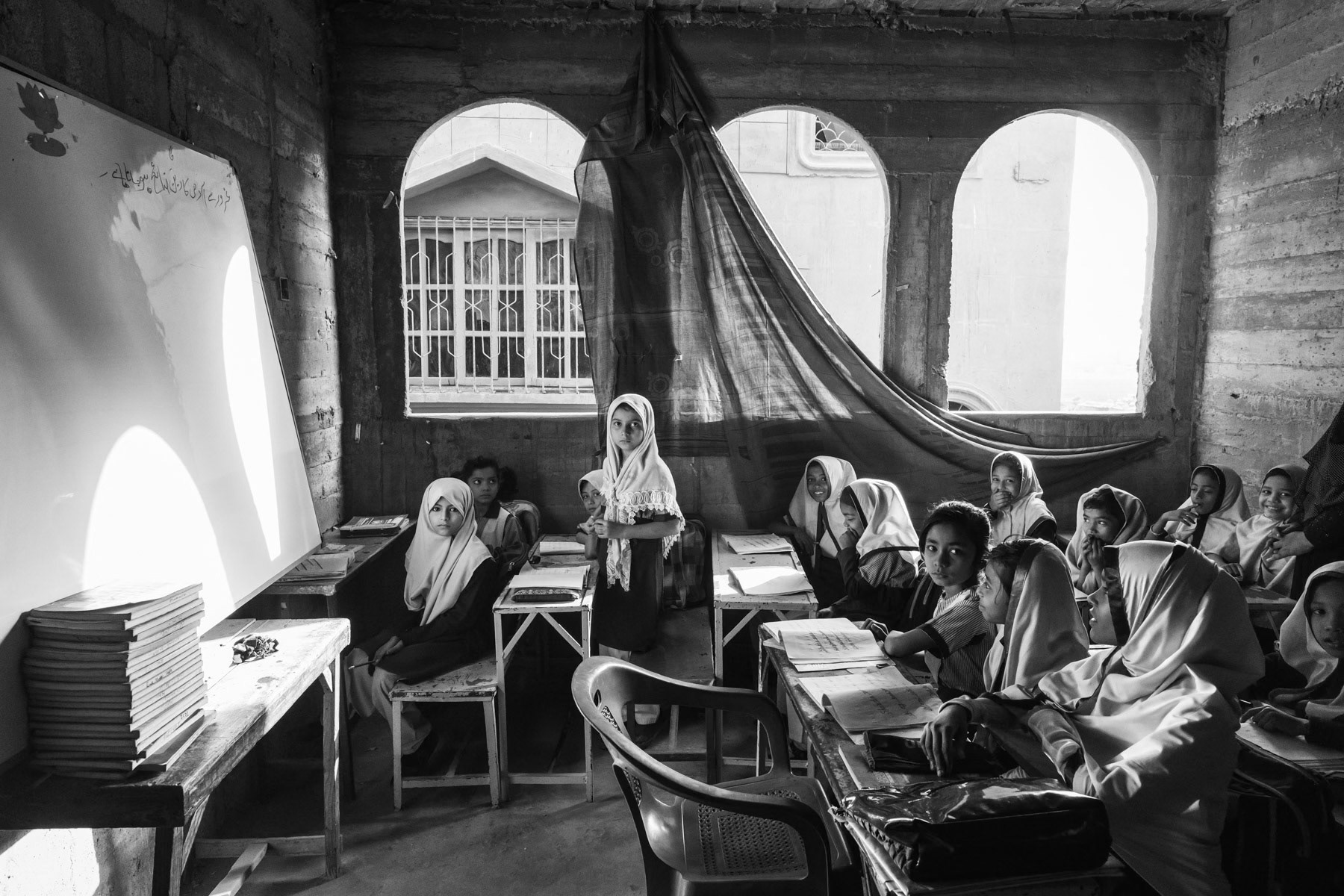 Private school for Rohingya children in Burma Colony. Karachi has a 300,000 strong Rohingya community that have settled there about 40 years ago. The majority of them have obtained Pakistanese citizenship through the years, however a substantial number still have no documents and remain stateless. Landhi district, Karachi, Pakistan, December 2016