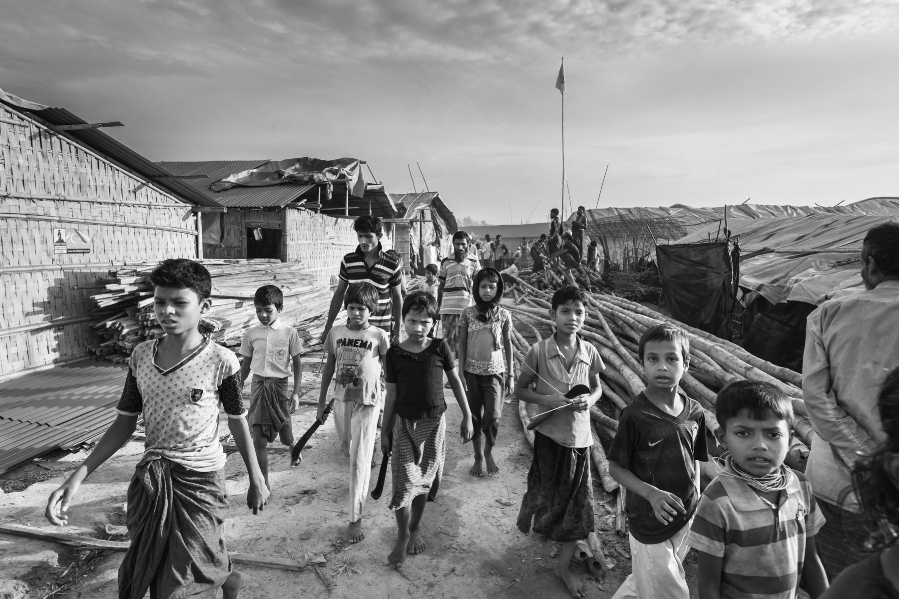 Rohingya children on the way to help fetch firewood, essential for cooking. Kutupalong extension for newly arrived refugees from Myanmar, Bangladesh, November 2017