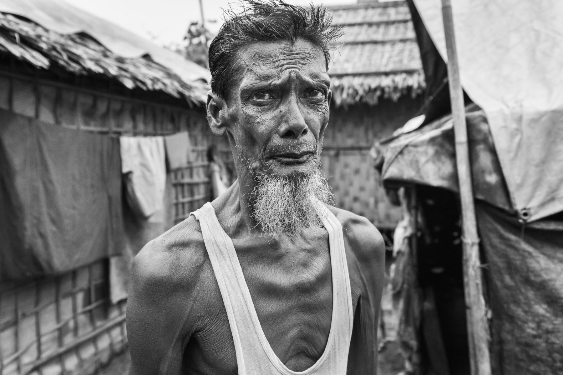 Rohingya displaced person entrapped in a concentration like camp where the population is not allowed to leave the camp. Thau Chaung internal displaced person camp, Sittwe, Myanmar, October 2016
