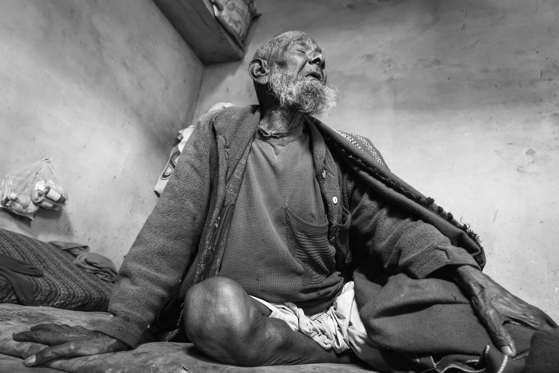 Siddiq Anur, served in the British army during and after WWII in what is now known as Myanmar. Came to Karachi in 1978 during the first wave of ethnic cleansing against the Rohinya in Burma. His family claims he is 115 years old, in his nineties is probably more accurate. Arkanabad, Pakistan, March 2018