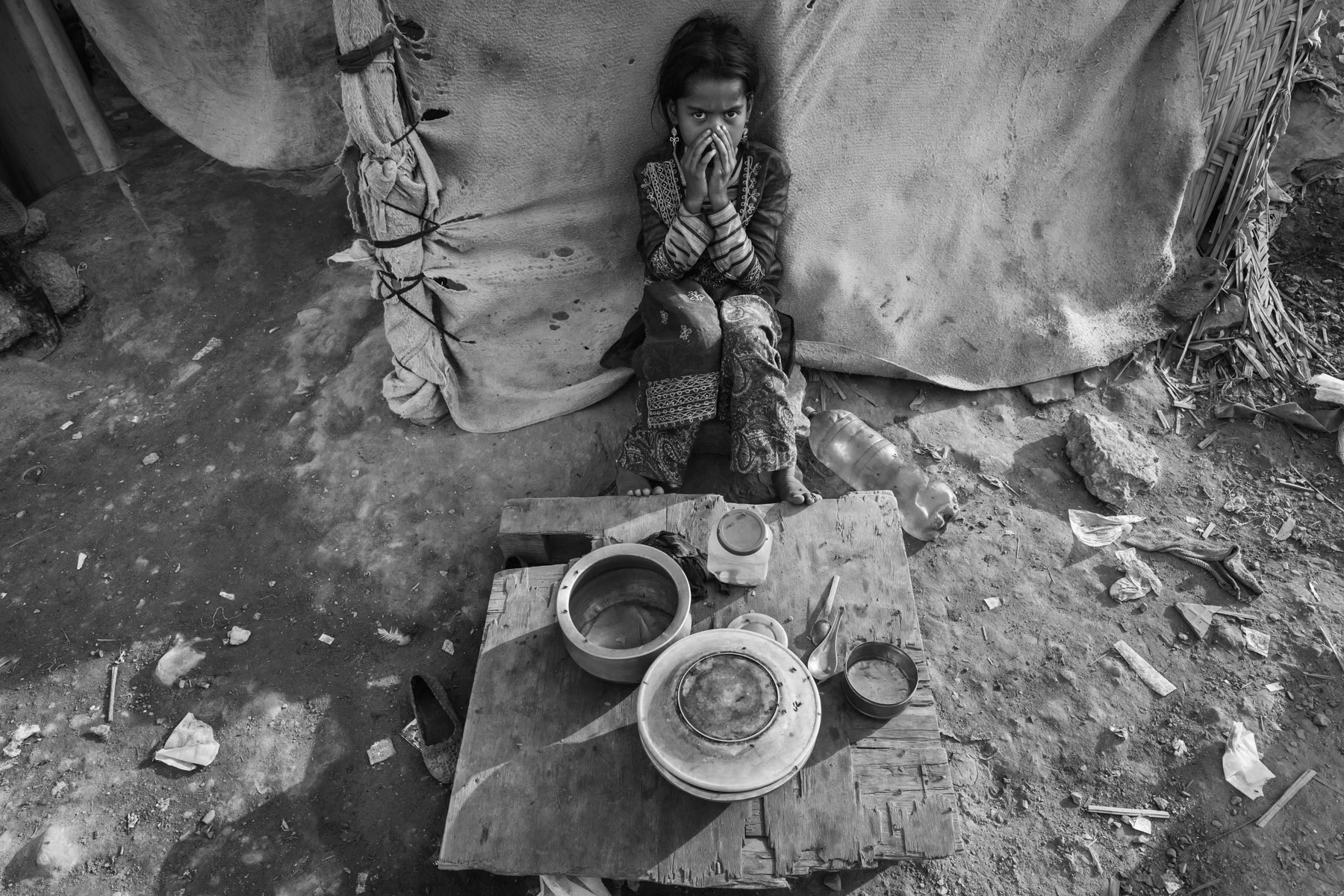 Girl from the Rohingya comminity selling food. Bilal Colony in Korangi part of greater Karachi, Pakistan, December 2016