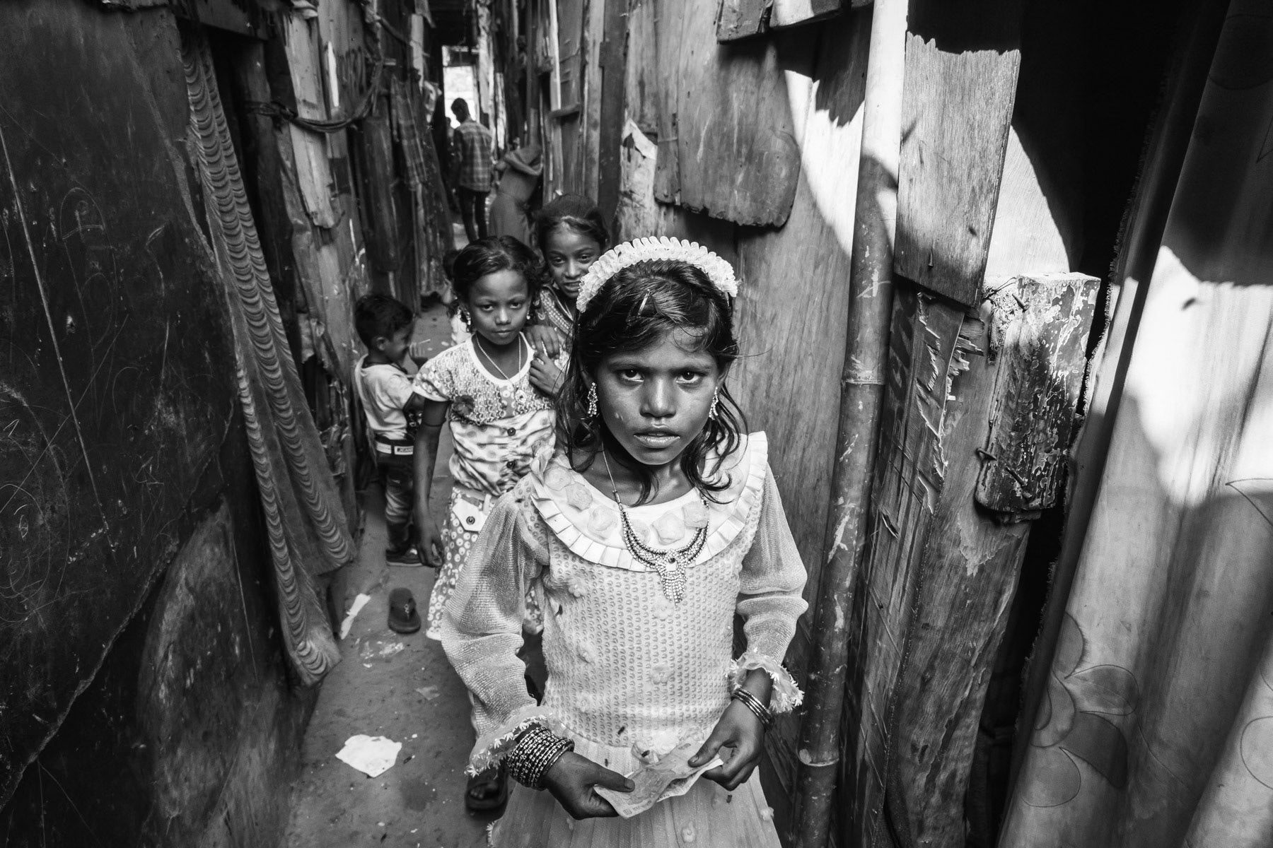 Rohingya girls dressed for Eid celebrations, Kunjankuh urban camp sheltering 210 Rohingya since 2013. Madanpur Khader area near Okhla in New Delhi agglomeration, India, June 2017