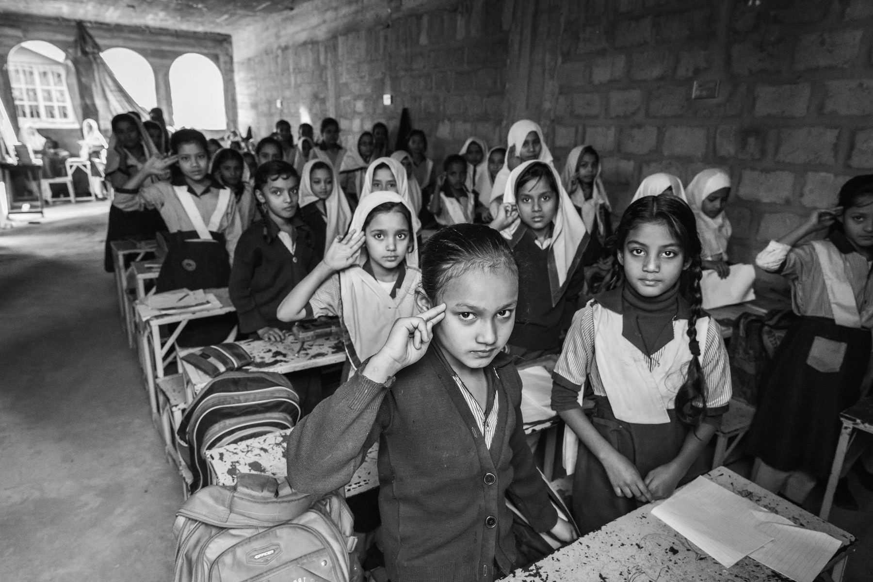 Third generation of Rohingya refugees from Burma attending high school in Burma Colony in Korangi district. Over 300,000 Rohingya and their descendants live in Karachi, Pakistan, December 2016