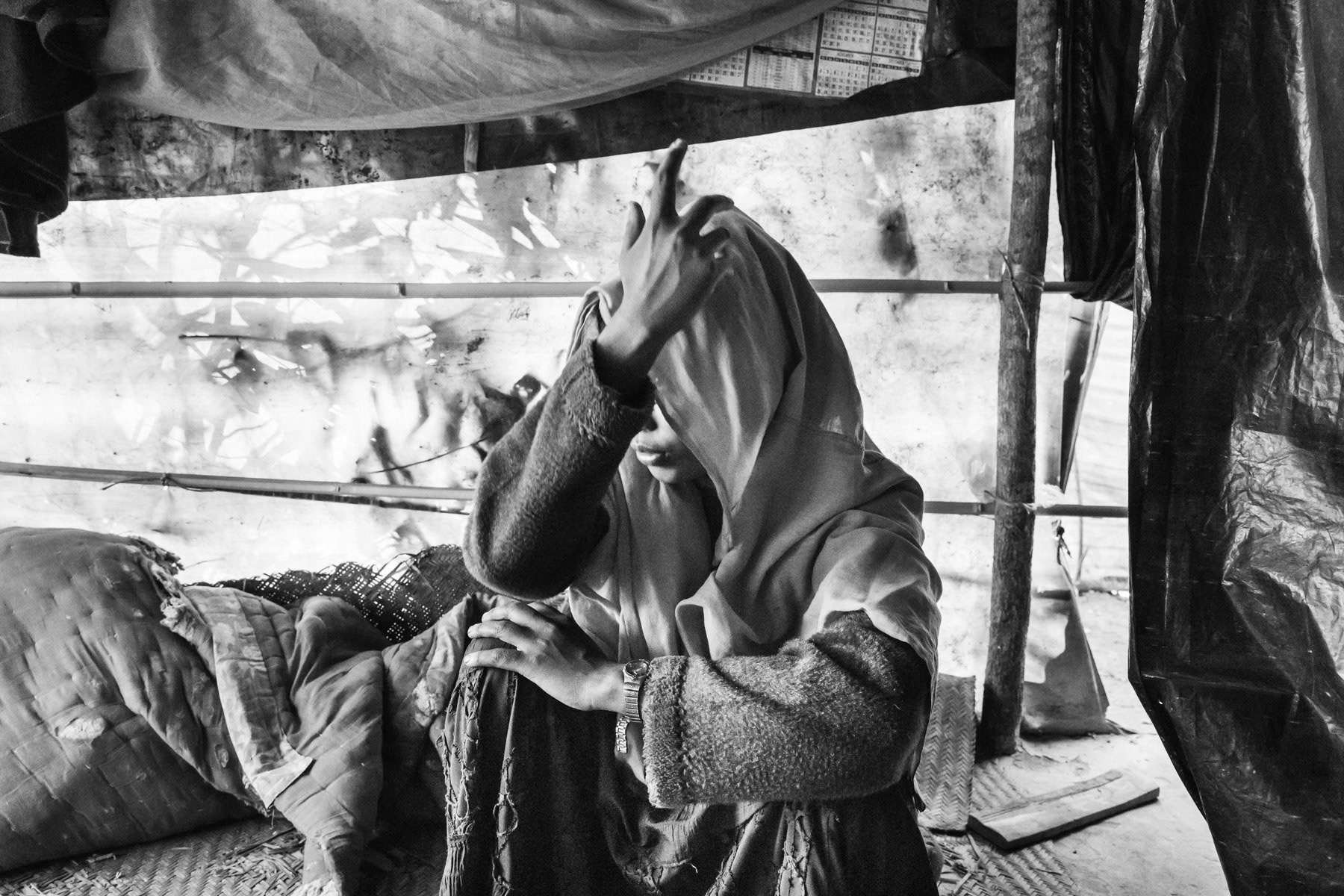Eighteen year old Nurkaydha from northern Maungdaw township in Myanmar was gang-raped for 3 days by soldiers before making an escape accross the border. She lives now with her sister, also a victim of physical torture. Balukhali refugee camp for Rohingya near Teknaf, Bangladesh, February 2017