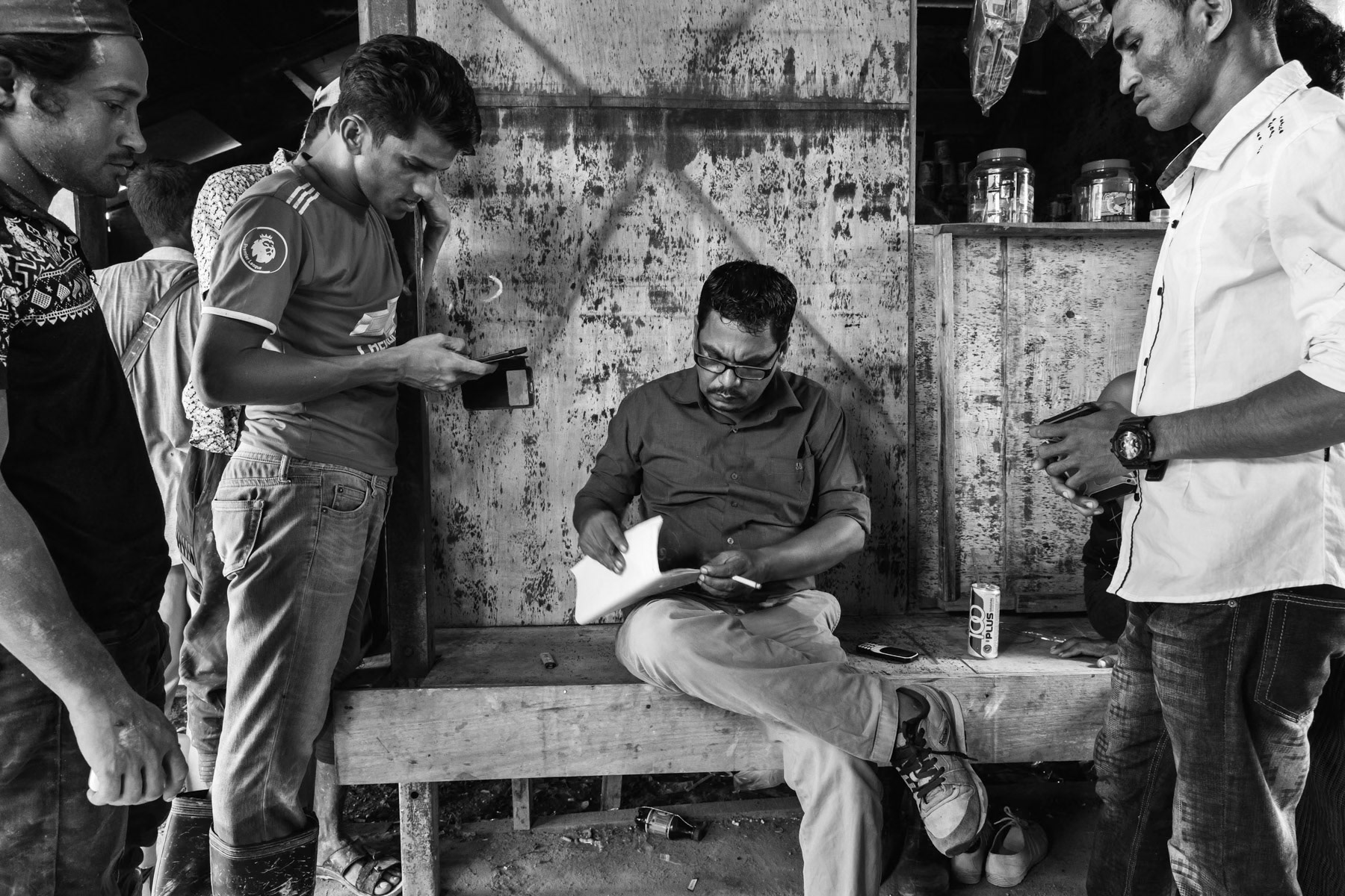 A Rohingya activist collecting basic data of 40 undocumented Rohingya construction workers. Once they receive a UNHCR refugee card they are more protected of abuse and arbitrary arrest by the immigartion police. Lunas in Kedah State, Malaysia, November 2018