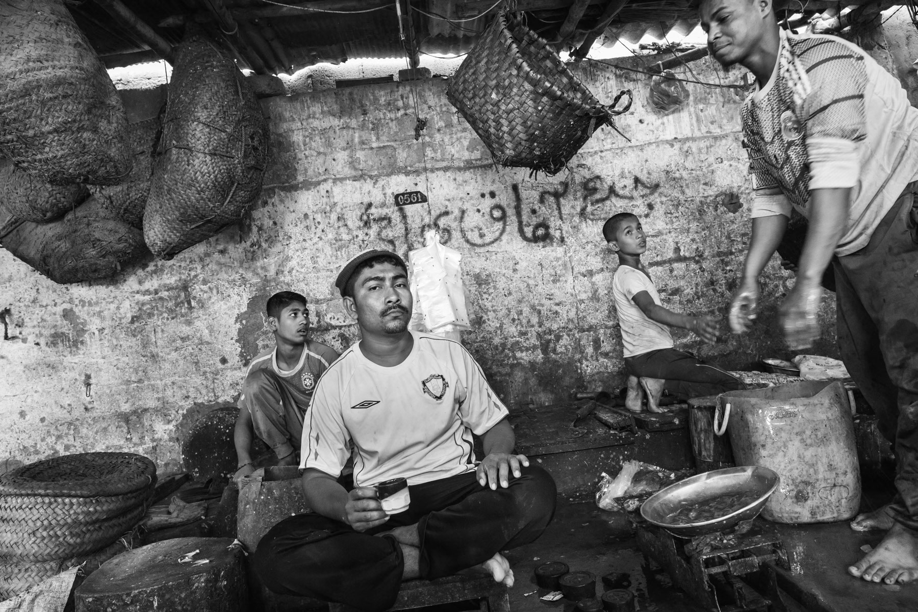 A lot of the 300,000 strong Rohingya community of Pakistan is involved in fisheries like their ancestors in Burma. Burma Colony fish market, Karachi, Pakistan, December 2016