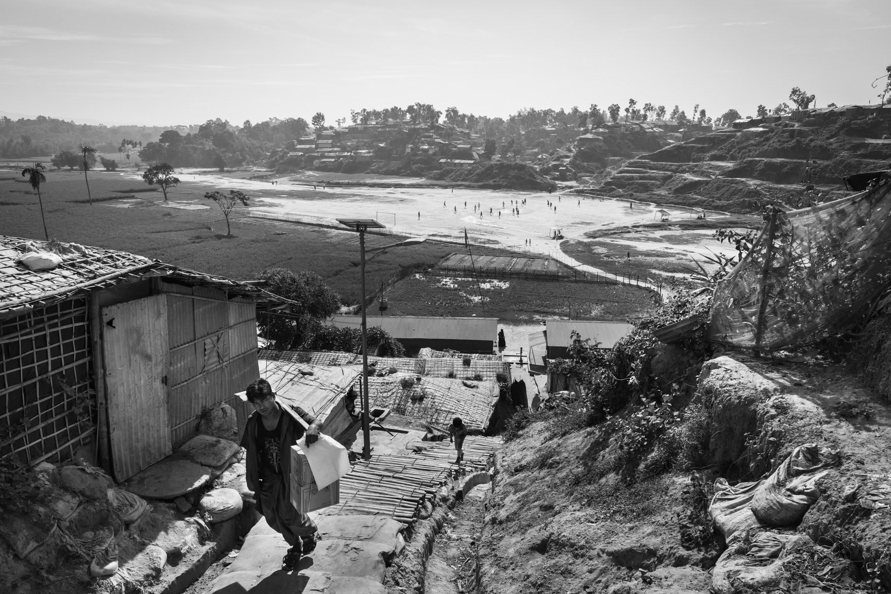 A new extension to the already overcrowded refugee camps to shelter part of the 650,000 newly arrived Rohingya refugees. The Rohingya refugee camps are now sheltering Rohingya victims of the 1978, 1992, 2008, 2012, 2016 and 2017 ethnic cleansing campaigns. By end 2018 more than one million Rohingya refugees live in the camps near Cox's Bazar making it the largest refugee camps in the world. Kutupalong section II, Ukhiya, Bangladesh, October 2018