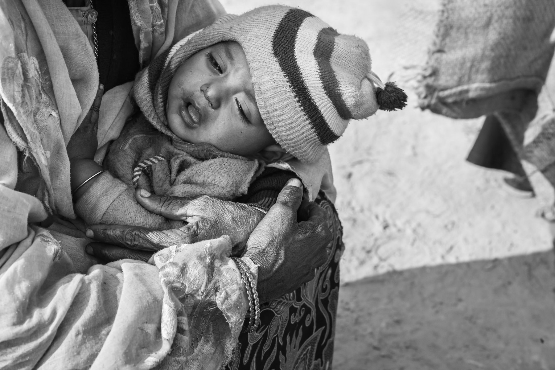 Grand mother and her grand child after having fled from Myanmar few days ago. Kutupalong Rohingya refugee camp, Bangladesh, February 2017