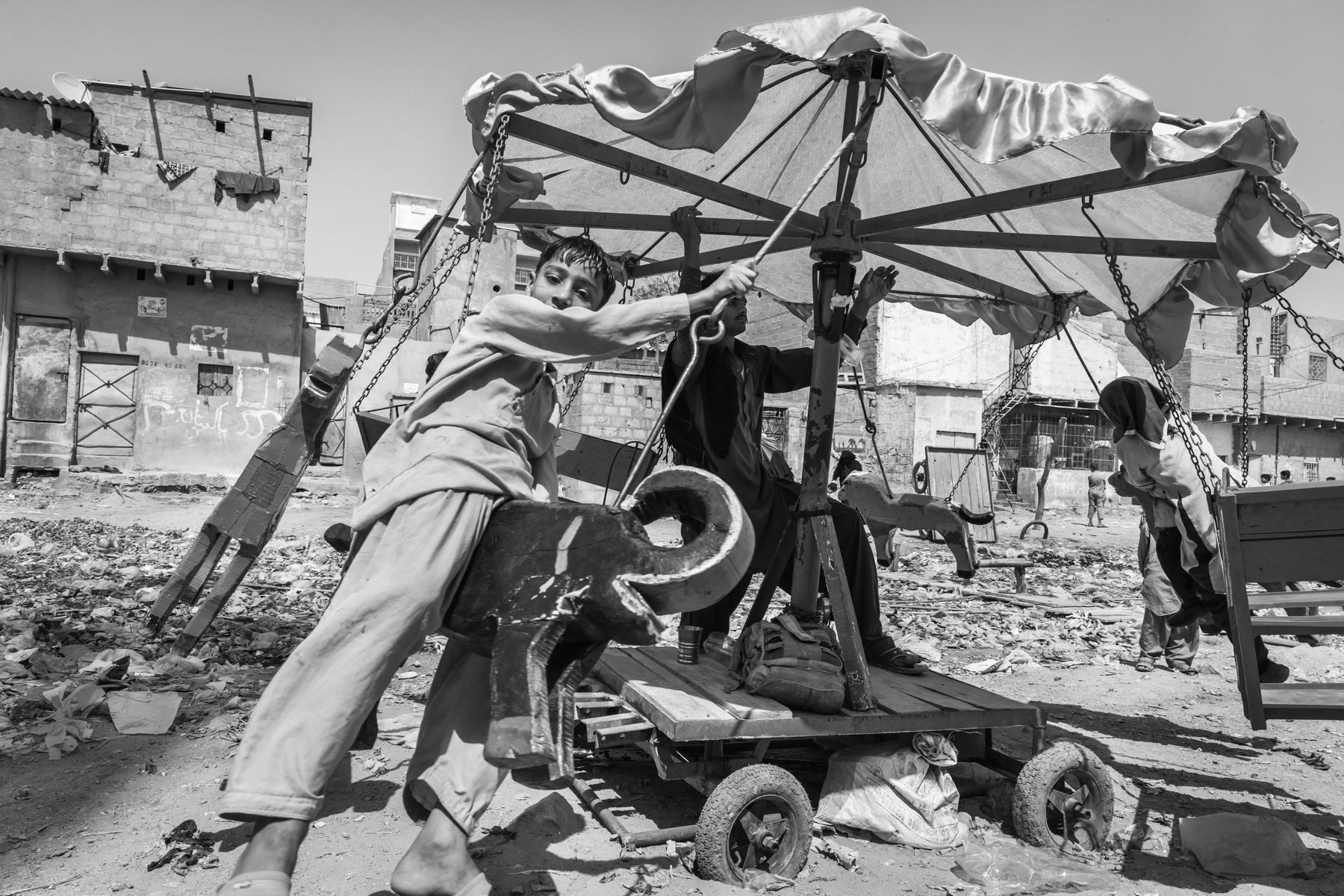 Children play, Rohingya area of Bilal Colony in Korangi, Karachi, Pakistan, March 2018