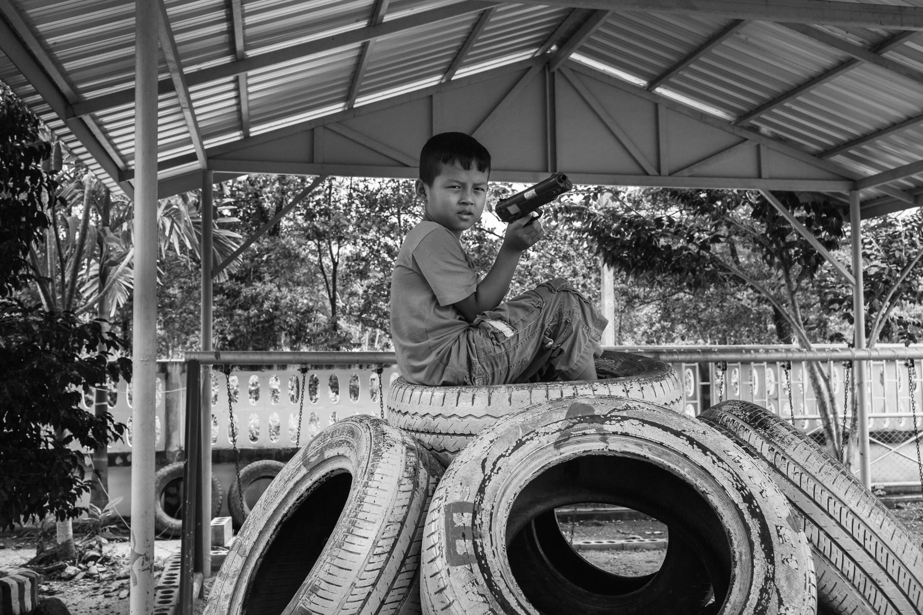 Boy enrolled in a school for refugee and migrant's children from Myanmar. Phang-Na near Khaolak in Southern Thailand, October 2016