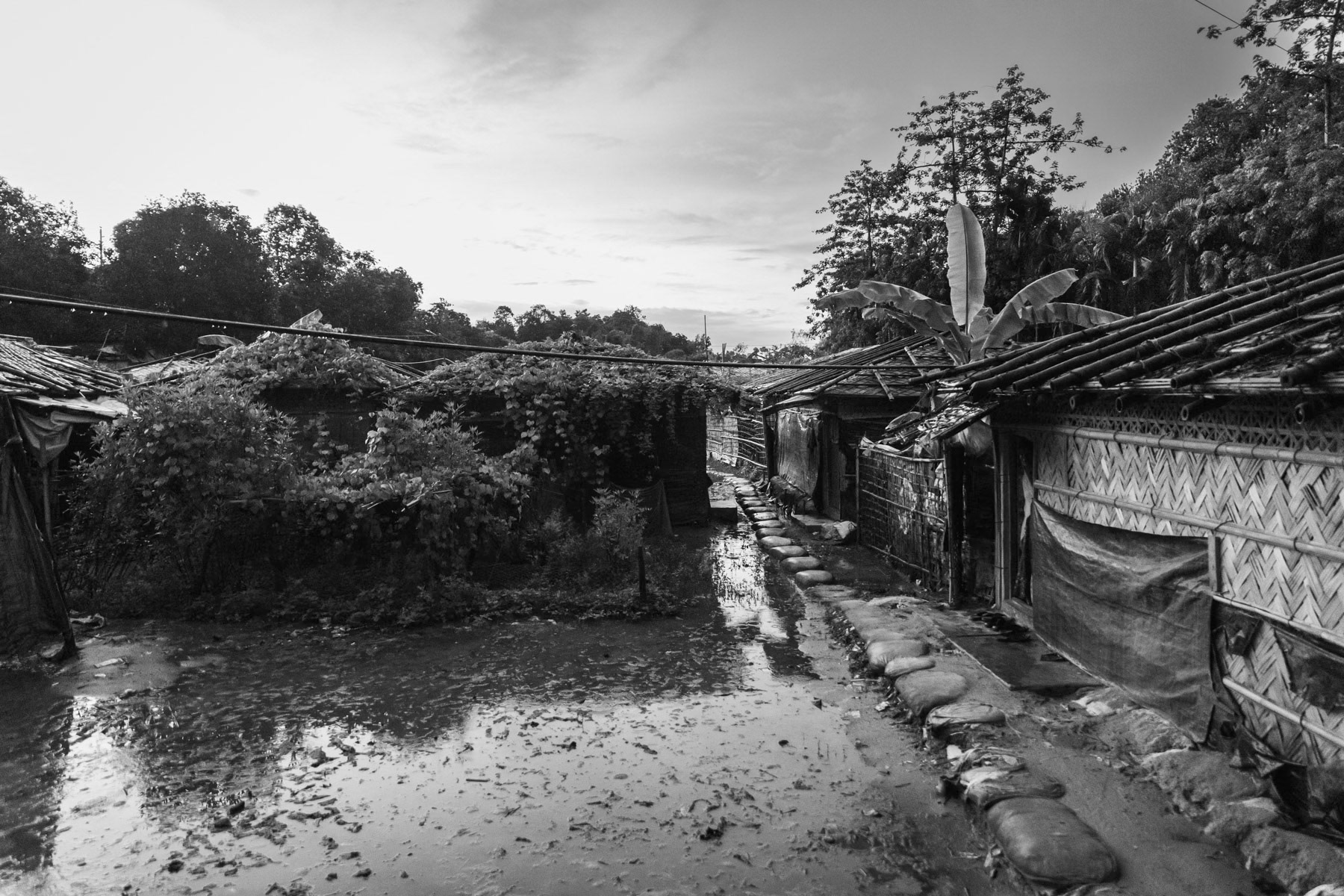 Rohingya refugee camp in Ukhiya where more than one million refugees live since the genocidal ethnic cleansing campaign of 2017 in neighbouring Myanmar. Five years after the massacres and mass exodus there is absolutely no perspective of re-settlement or repatriation. Freedom of movement has been restricted to the camps that are now fully sealed off with fences. Access to education and local schools has been denied, leaving a whole generation in limbo. Rohingya refugee camps, Cox's Bazar, Bangladesh, September 2022