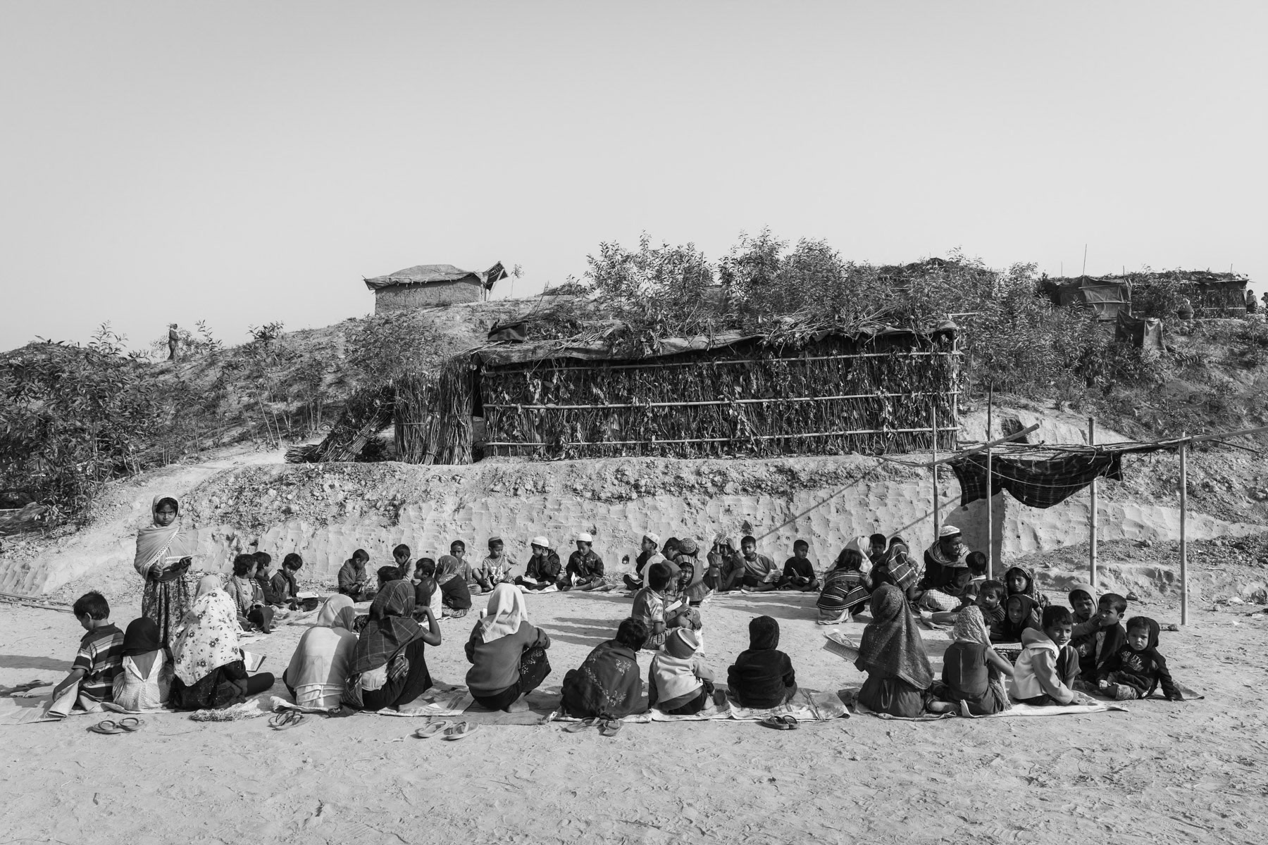 Improvised medressa or coranic school for Rohingya children that arrived from Myanmar during the past weeks. Having no access to formal education, un-registered Rohingya refugees have only the coranic schools as a sole form of education. New part of Kutupalong refugee camp for newly arrived refugees from Myanmar. Cox's Bazar, February 2017