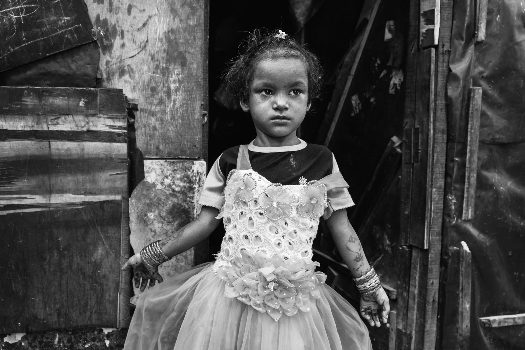 Rohingya girl dressed for Eid celebrations, Kunjankuh urban camp sheltering 210 Rohingya since 2013. Madanpur Khader area near Okhla in New Delhi agglomeration, India, June 2017