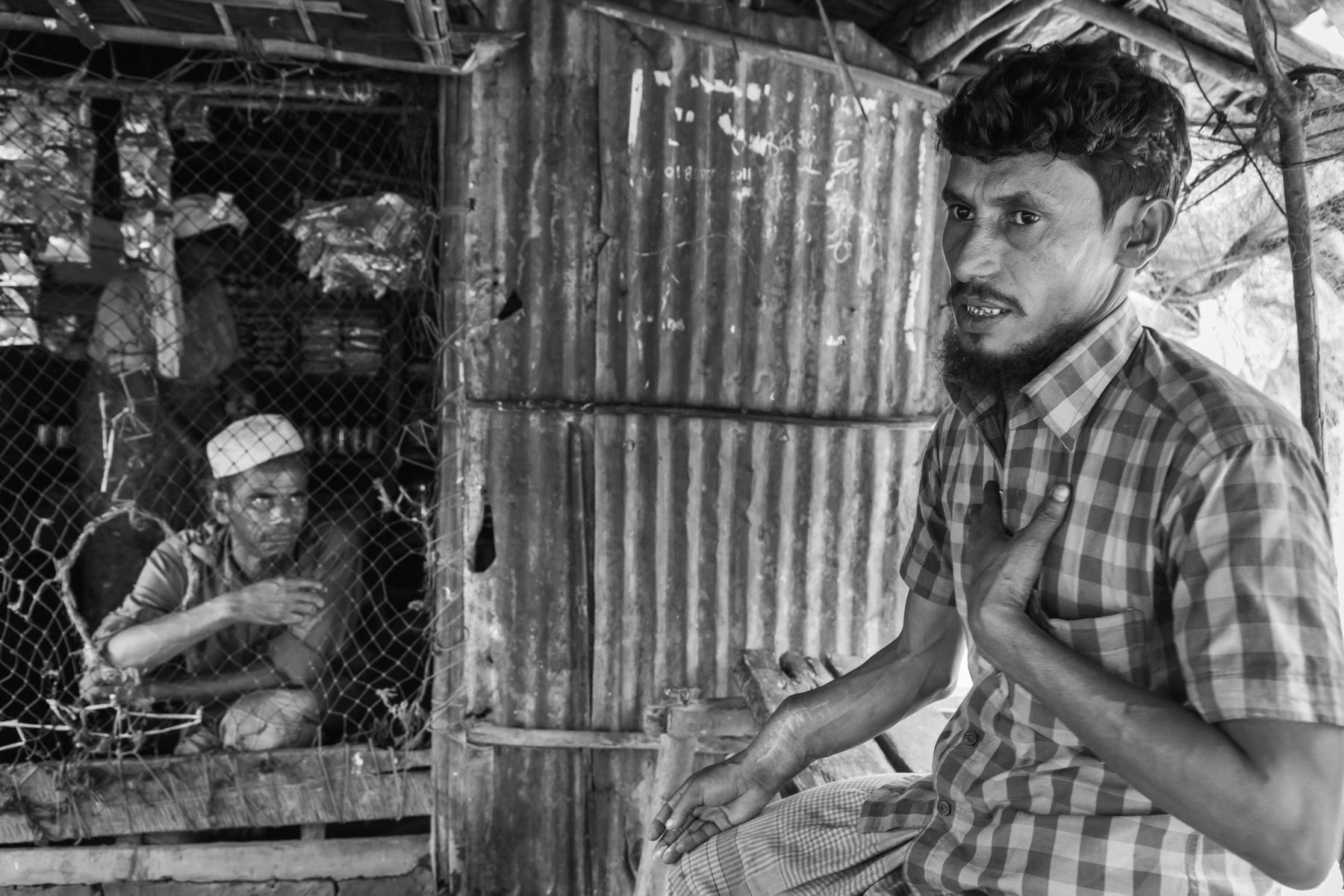 Thirty two year old Abdul Amin was a agriculture labouror and arrived in September 2017 in Bangladesh with his wife and 3 children. He got shot in the arm while their village was attacked by the Myanmar military. The entire village was burnt down. It took him and his family five days to reach safety in Bangladesh. Due to delayed medical care after the gun shot, he will probably sustain permanent disability on his right arm. Shamlapur camp, Shamlapur near Teknaf, Bangladesh, November 2017