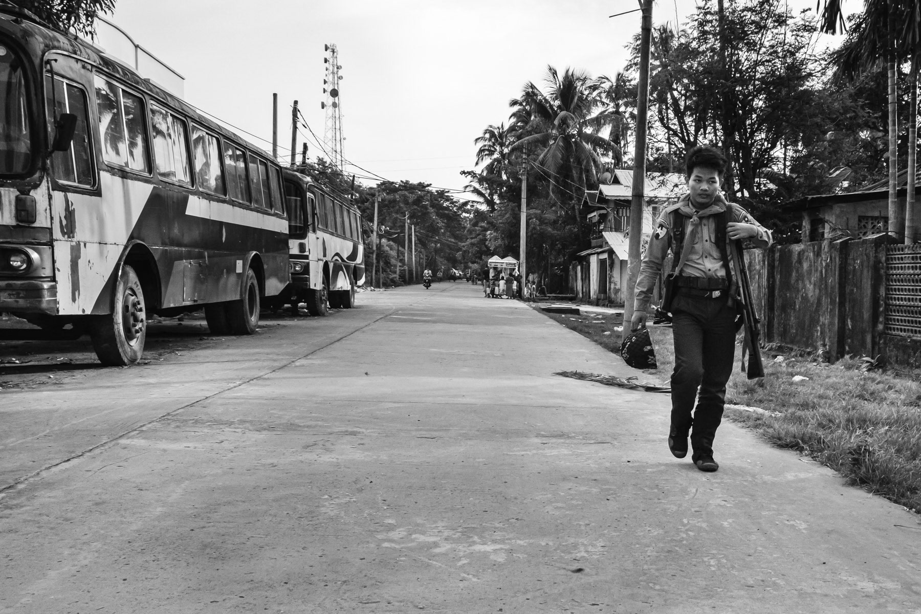 Myanmar police going to start his duty at one of the check points of fully sealed off Rohingya gettho of Aung Mingalar in Sittwe. The Rohingya population is not allowed to leave that part of town since the inter ethnic violence of 2012 and live in a de-facto concentration camp. The State capital of Rakhine, Sittwe, Myanmar, September 2019