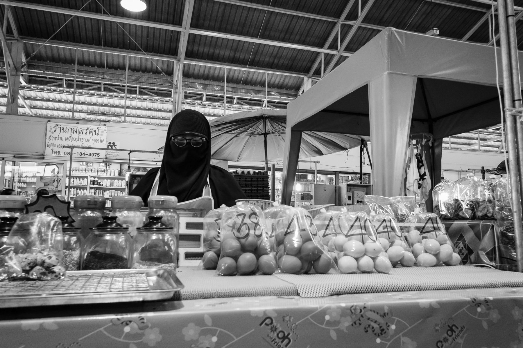 Burmese market in Bangkok where migrants and refugees from Myanmar find a piece of home. Bangkok suburbs, Thailand, June 2016