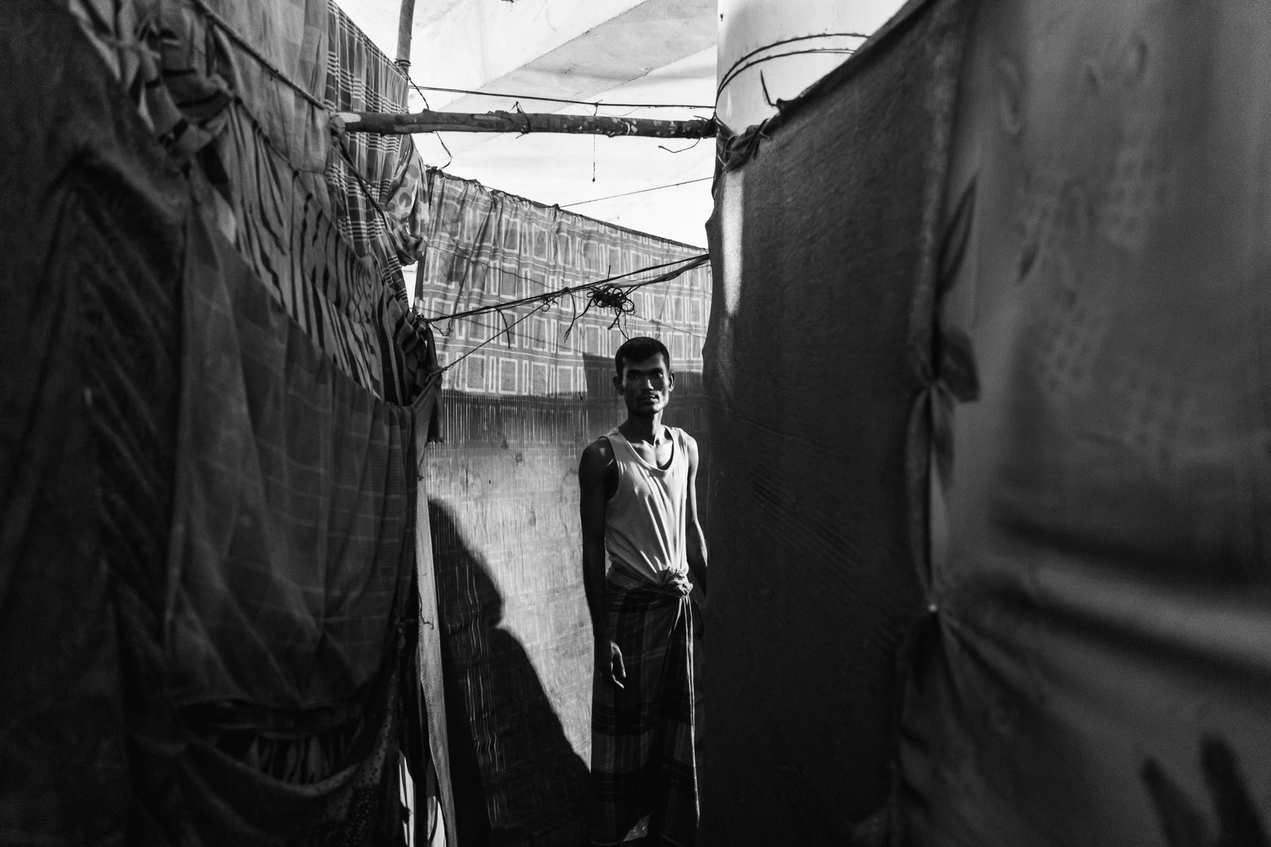 A Rohingya refugee in an abandonned cyclone shelter hosting 20 families for the past 3 years. Kelembakkam in Tamil Nadu State, India, June 2017