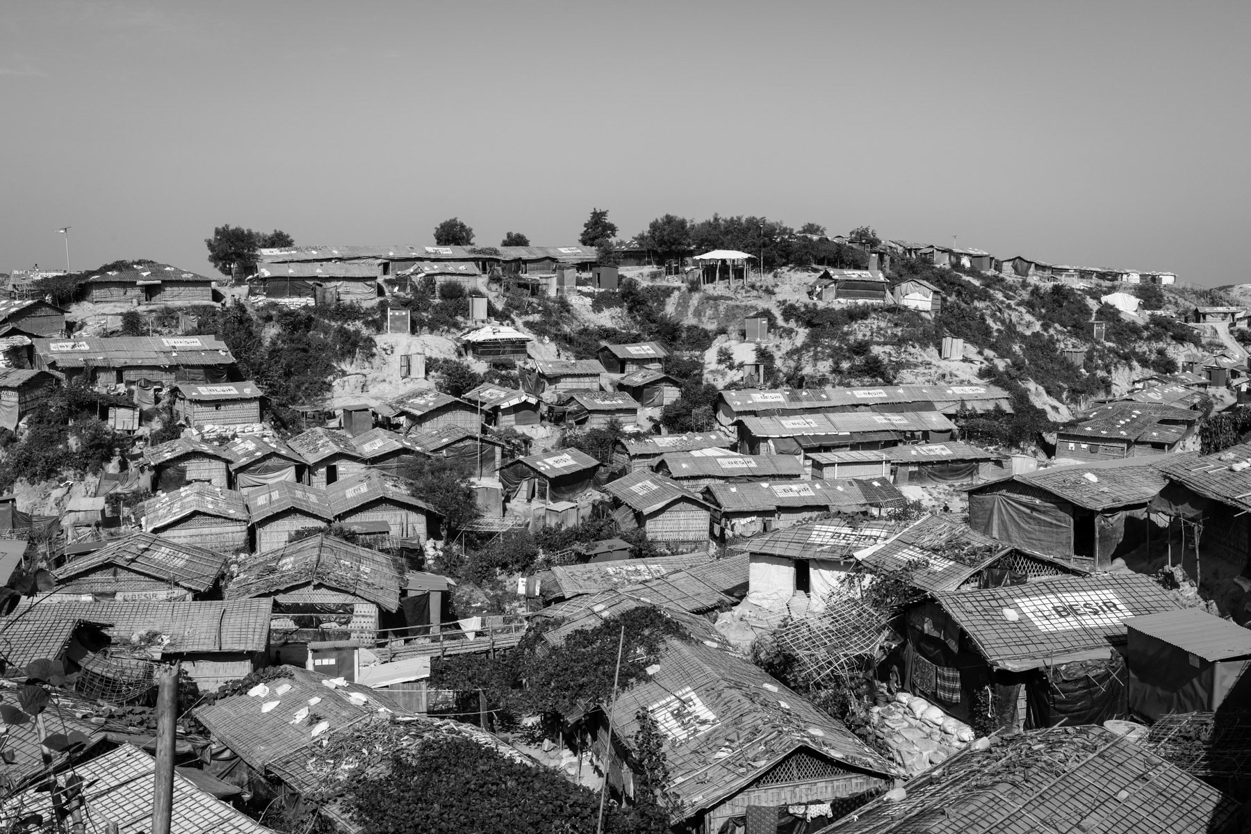A new extension to the already overcrowded refugee camps to shelter part of the 650,000 newly arrived Rohingya refugees. The Rohingya refugee camps are now sheltering Rohingya victims of the 1978, 1992, 2008, 2012, 2016 and 2017 ethnic cleansing campaigns. By end 2018 more than one million Rohingya refugees live in the camps near Cox's Bazar making it the largest refugee camps in the world. Thangkhali section, Ukhiya, Bangladesh, October 2018