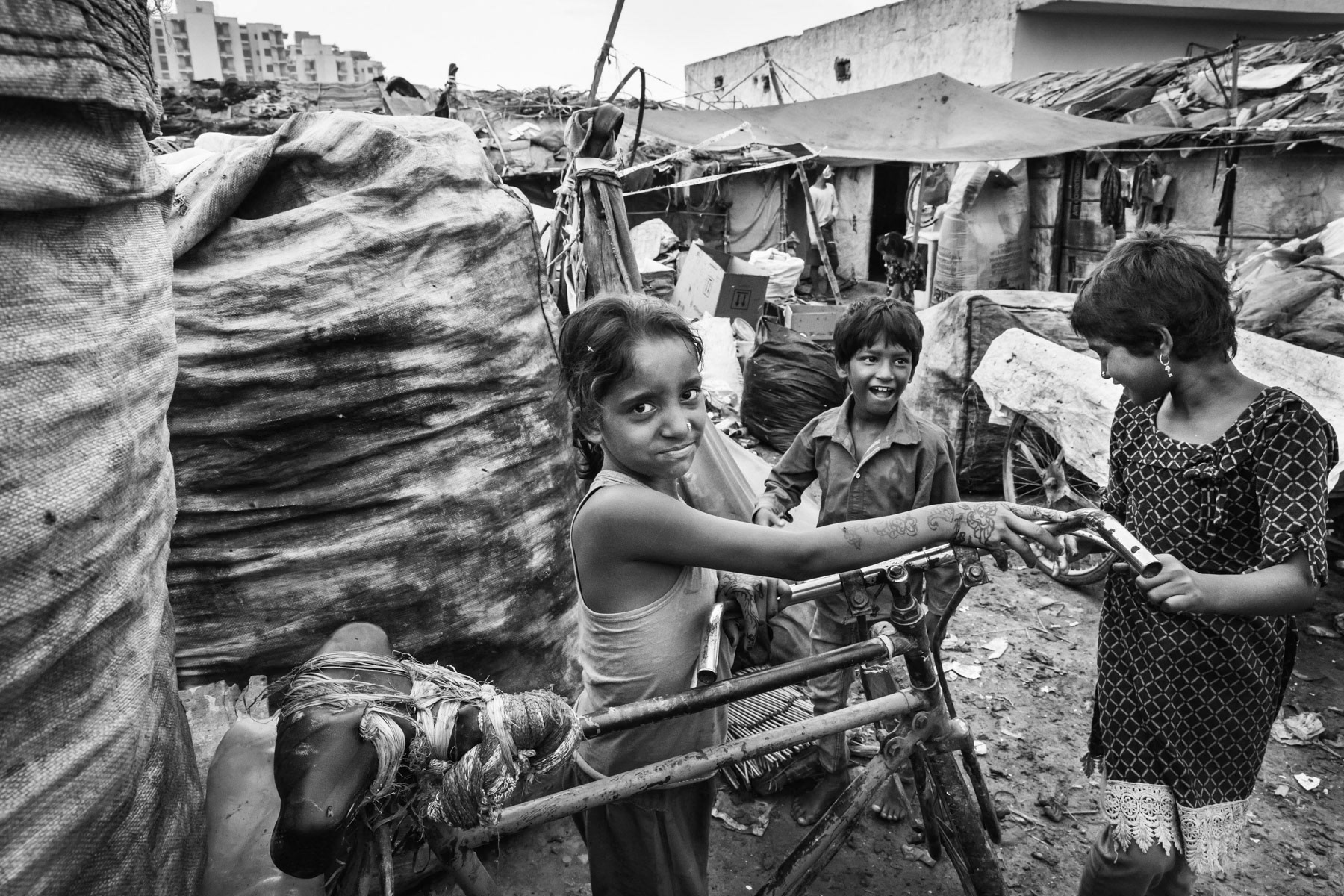 Rohingya refugees living in a state of bonded labour, working until they can pay off their debts for having been smuggled into India. There is a large proportion of child labour as the entire family is set to work. For these children school is inaccessible. Faridabad in Haryana State, India, June 2017
