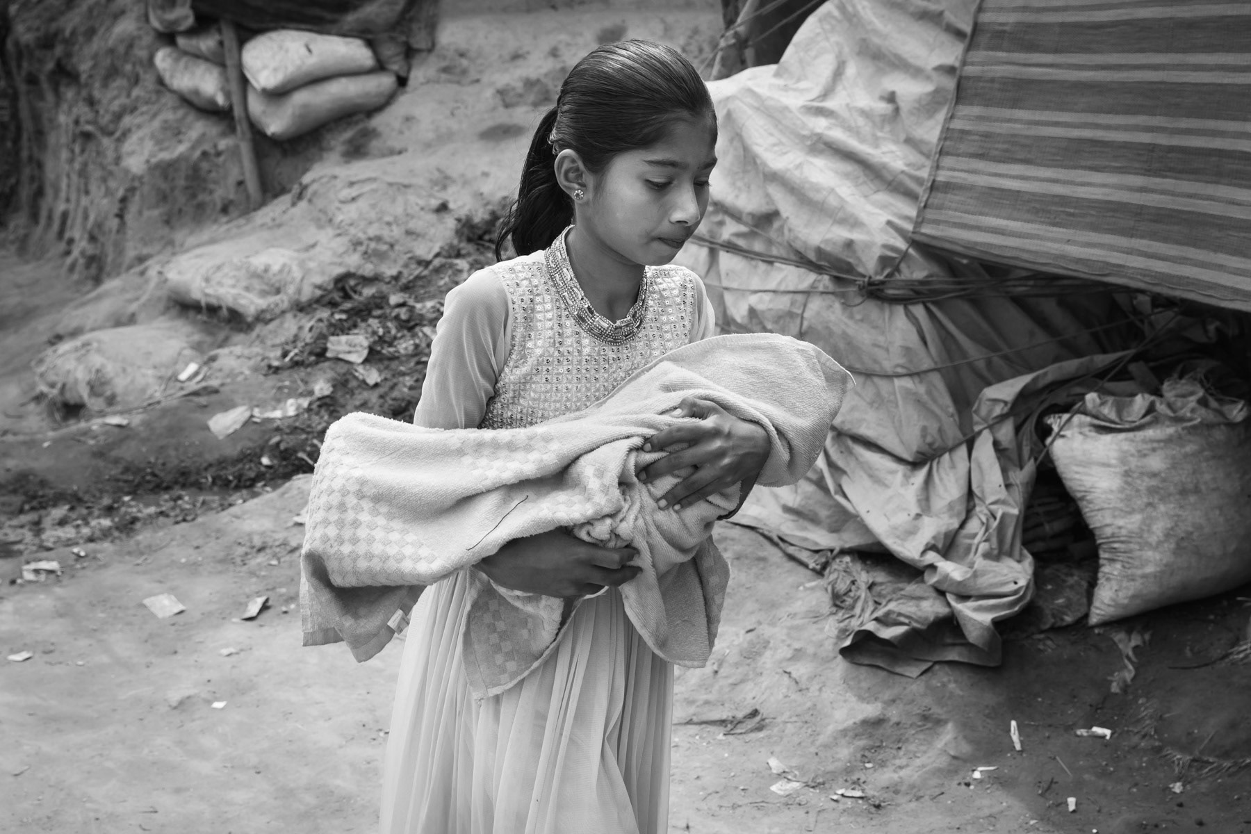 A Rohingya refugee that recently arrived from Myanmar. Rohingya have fled Myanmar since August and the start of the latest military security operations that are now widely qualified as ethnic cleansing campaigns. Balukhali camp, Ukhiya, Bangladesh, March 2018