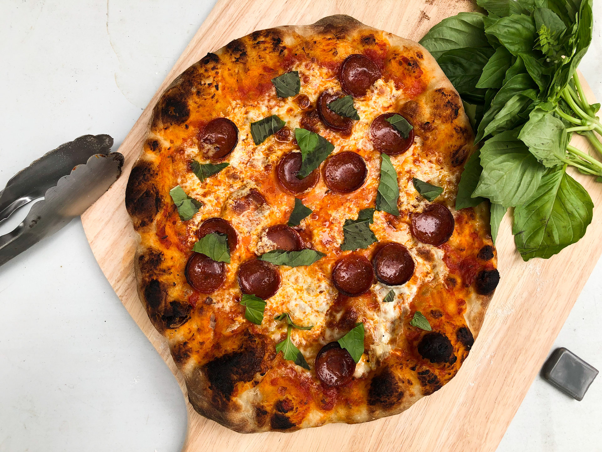Fun fact: The firebox of a wood burning offset smoker can double as a pizza oven.