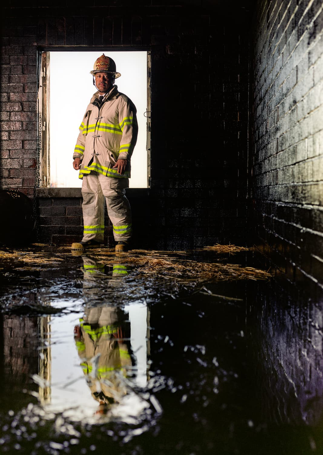 Fire Chief Cherry standing in a burnout building Sacramento, California